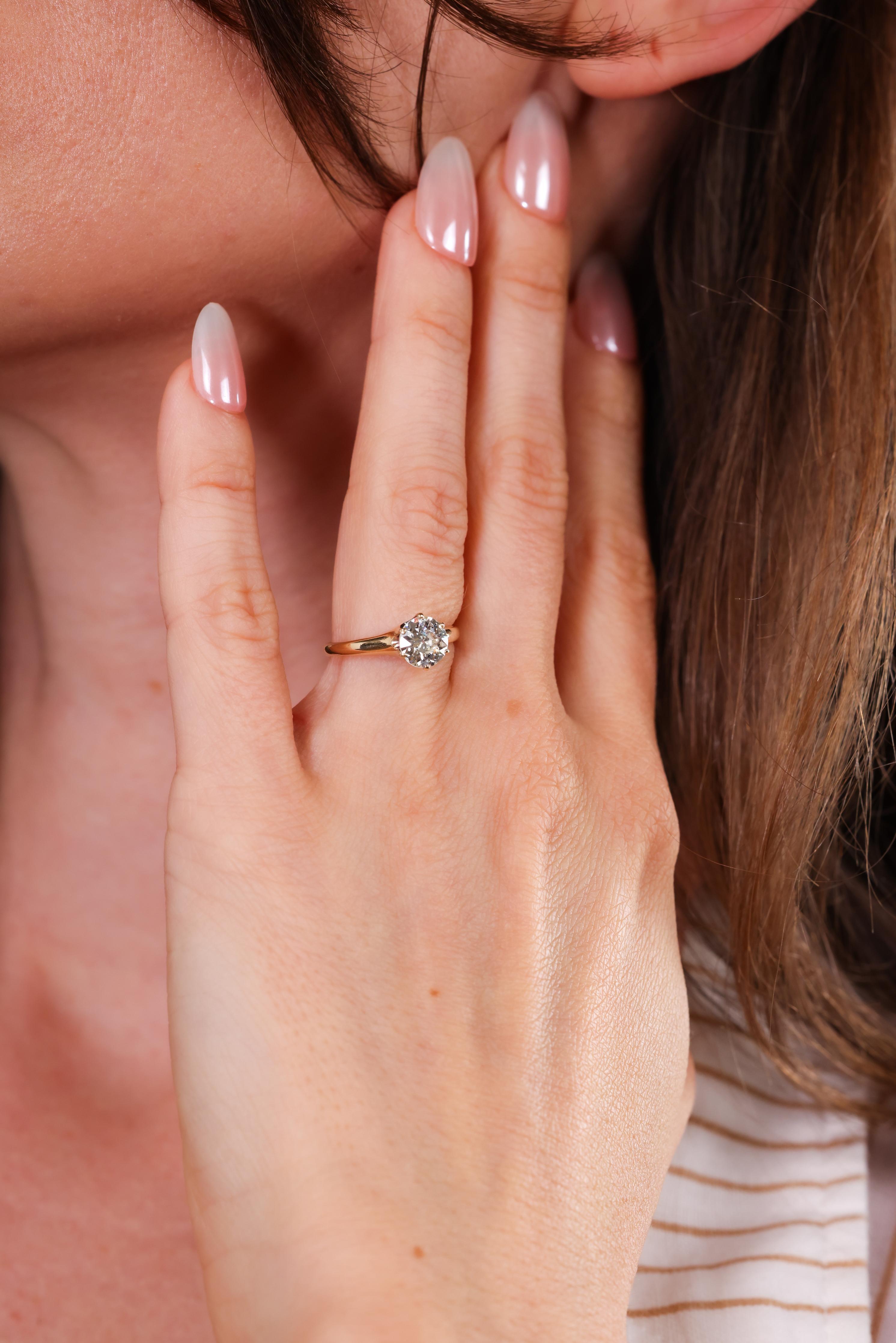Certificate: GIA
Center Stone: Diamond
Cut: Old European
Weight: 0.98 carats
Color: L
Clarity: SI2 
Metal: 14k yellow gold 
Era: Victorian 
Circa: 1890s
Size: 4-3/4 and can be resized 
Gram weight: 2.0
  
Step back in time with this exquisite