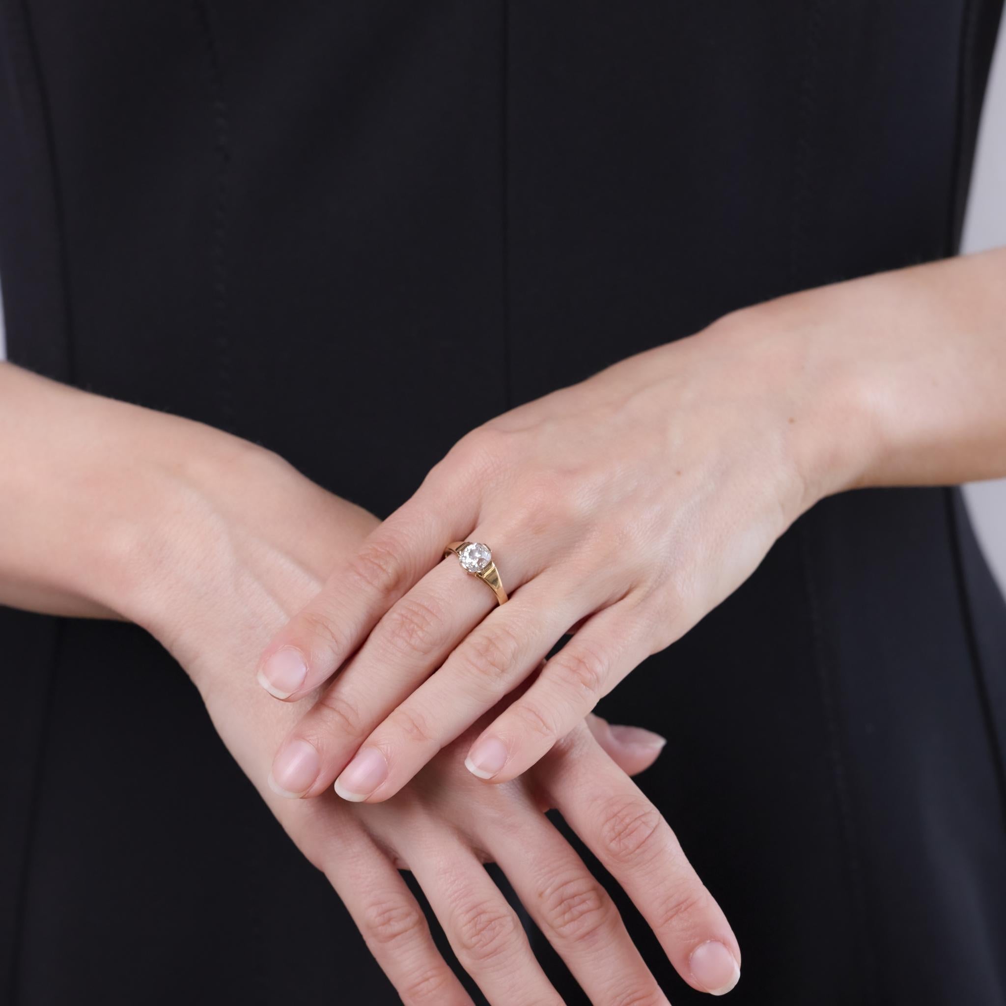 This Victorian ring from the early 1900s features a 1.61 carat old mine cut diamond, certified by GIA (#2235351451) as I color and I1 clarity. Set in warm 14k yellow gold, the ring highlights the antique diamond’s broad facets and vintage charm.