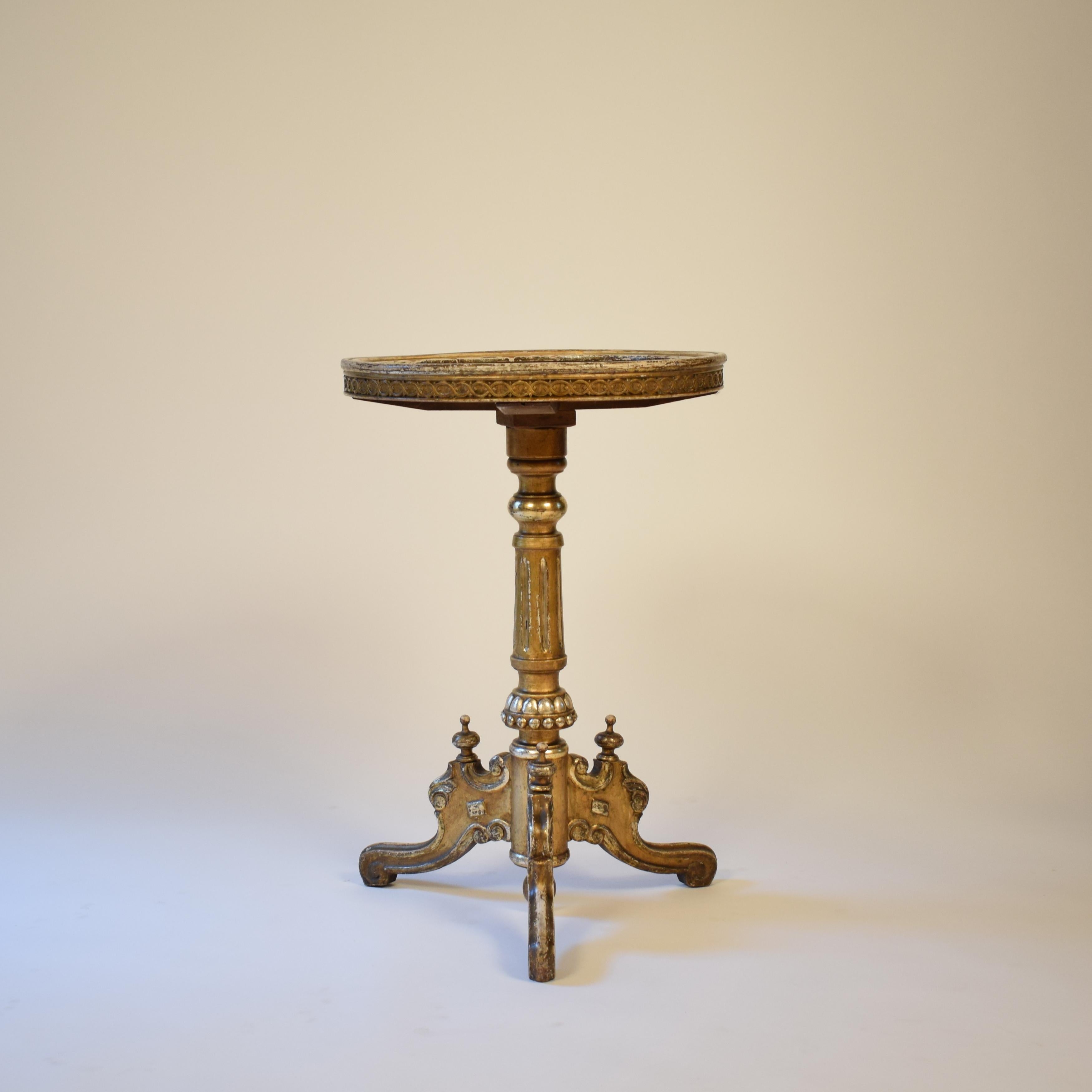 This beautiful and exceptional Victorian gilded side table was build circa 1870 in Germany.
The piece is in its original condition and has a wonderful Patina. Themarquetry is in burr walnut and different fruit woods which is very nice. The round