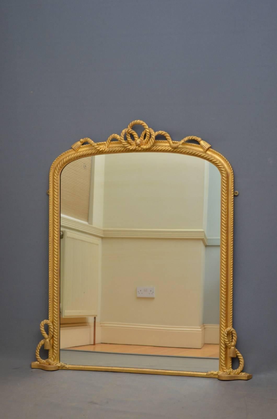 K0332 Victorian gilt overmantle mirror, having original mirror plate with some foxing in rope decorated frame. This antique mirror is in fantastic original condition throughout, ready to place at home. c1870
Measure: H 49.5