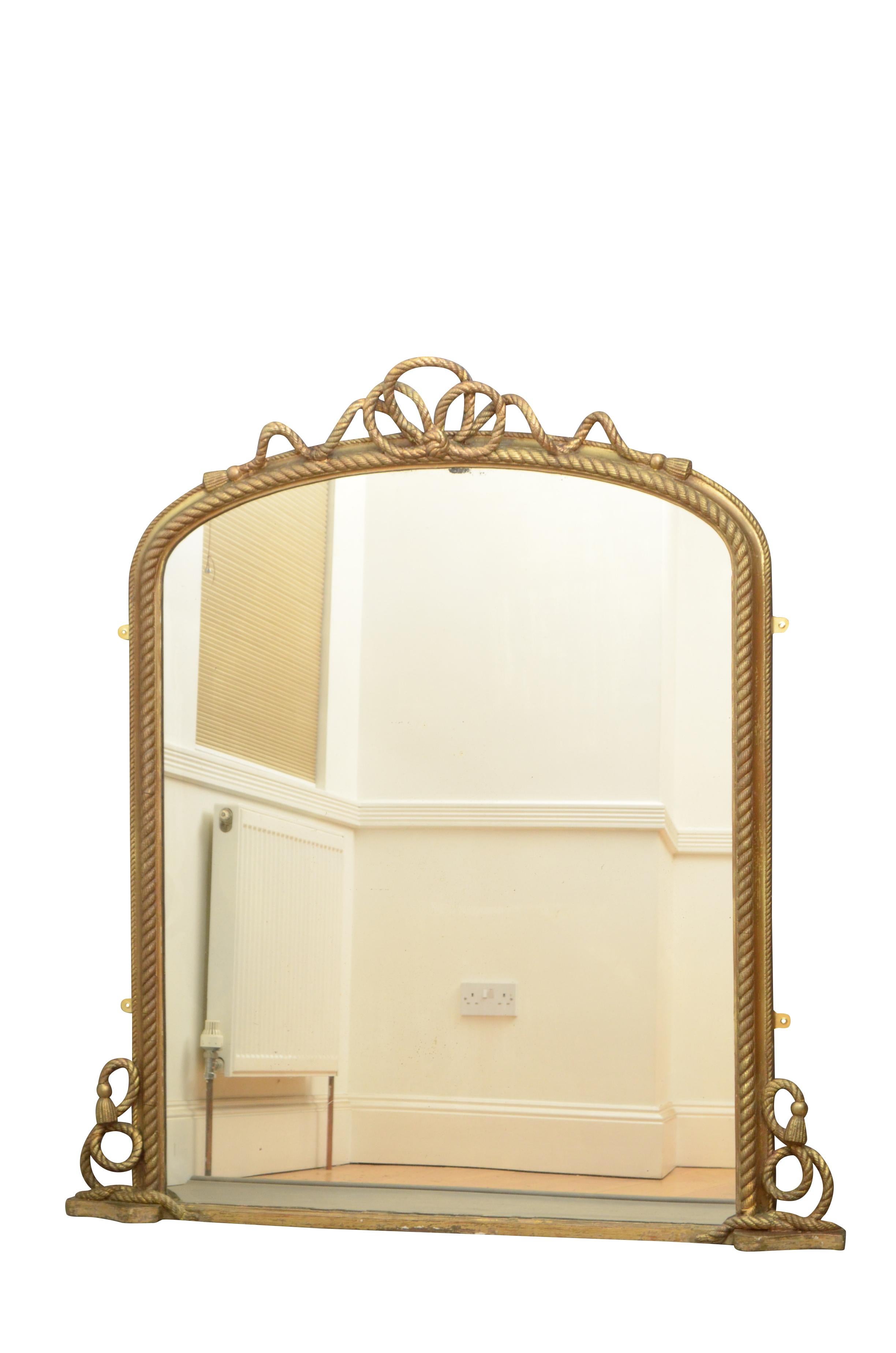Stylish Victorian giltwood wall mirror / over mantel mirror with original glass with some foxing in rope decorated gilded frame. This antique mirror retains its original glass, parts of original gilt with extensive touching up over the years and