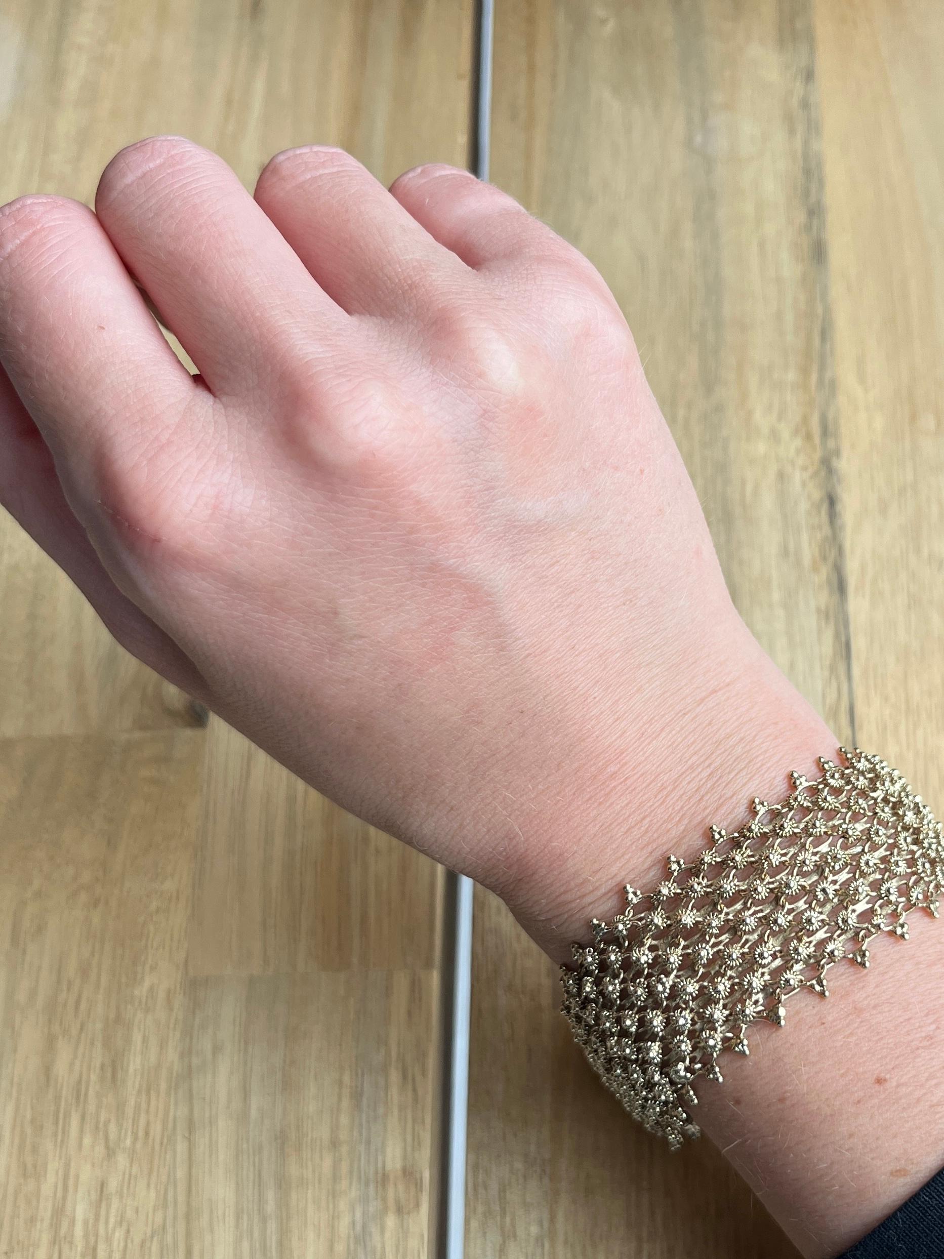 This Victorian bracelet is gilt and quite light weight and comfortable to wear. The design is stunning and so intricate. 

Length: 20cm
Width: 21mm

Weight: 34g

