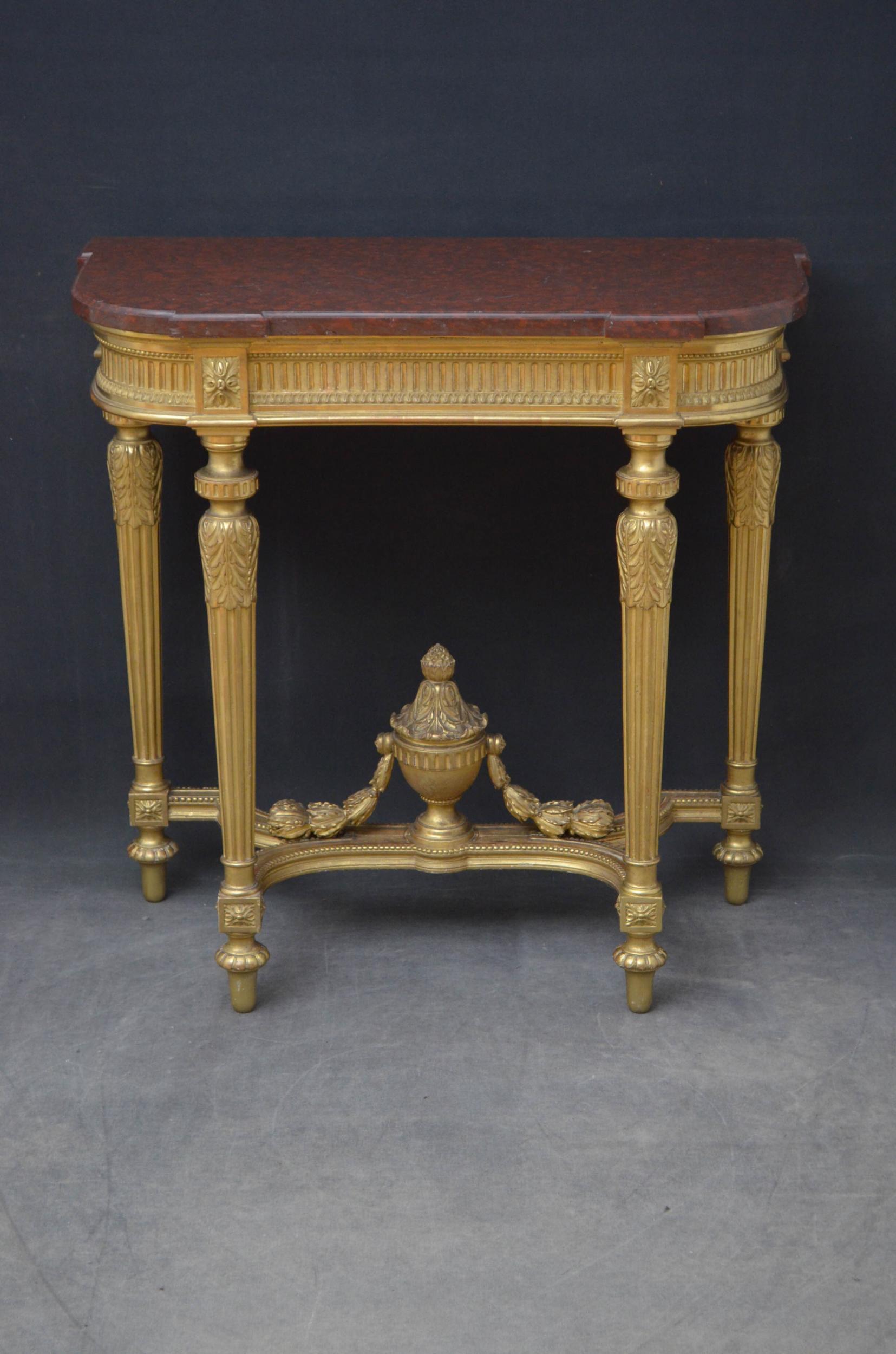 Sn4930 Elegant Victorian gilded console table in Regency taste, having original veined marble top enclosing original jardinière liner above moulded, beaded, reeded and carved frieze decorated with floral paterae, standing on slender turned, reeded