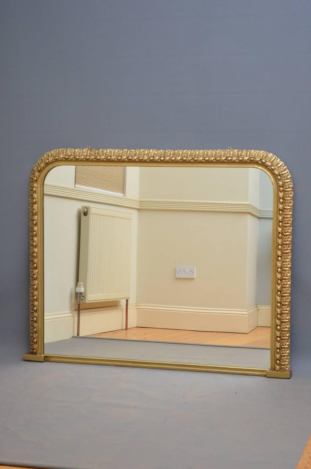 K0297, a large horizontal overmantel mirror, having original mirror plate in finely decorated gilt frame. This Victorian wall mirror has been refinished in the past and is in wonderful condition throughout - ready to place at home, 1870
Measures: H