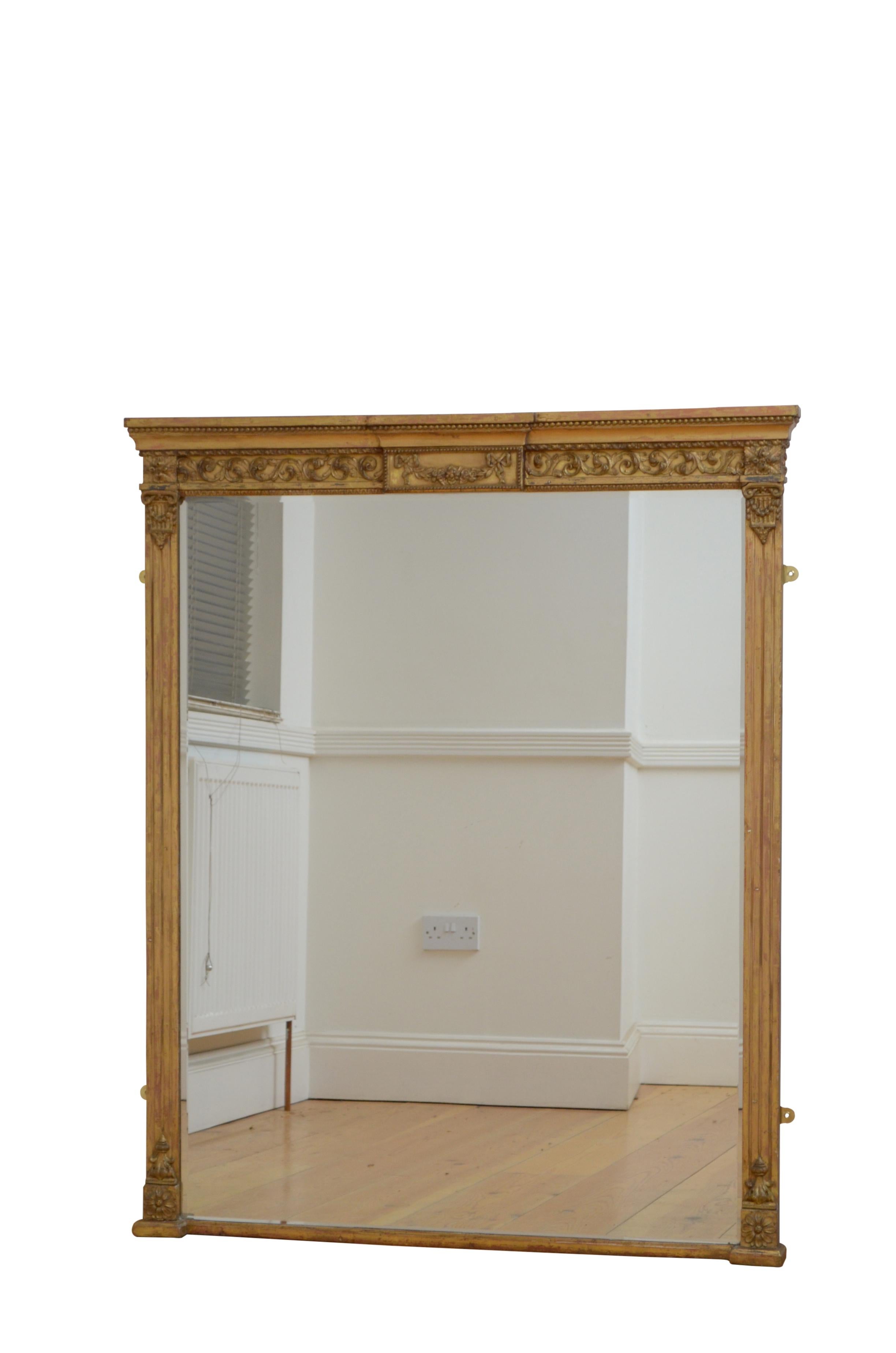 K0581 Fine Late Victorian gilded wall mirror, having original bevelled edge glass with minor imperfections, in gilded frame with moulded cornice, carved with ‘les pearls’ which symbolises strand of pearls and neo classical scrolls all flanked by