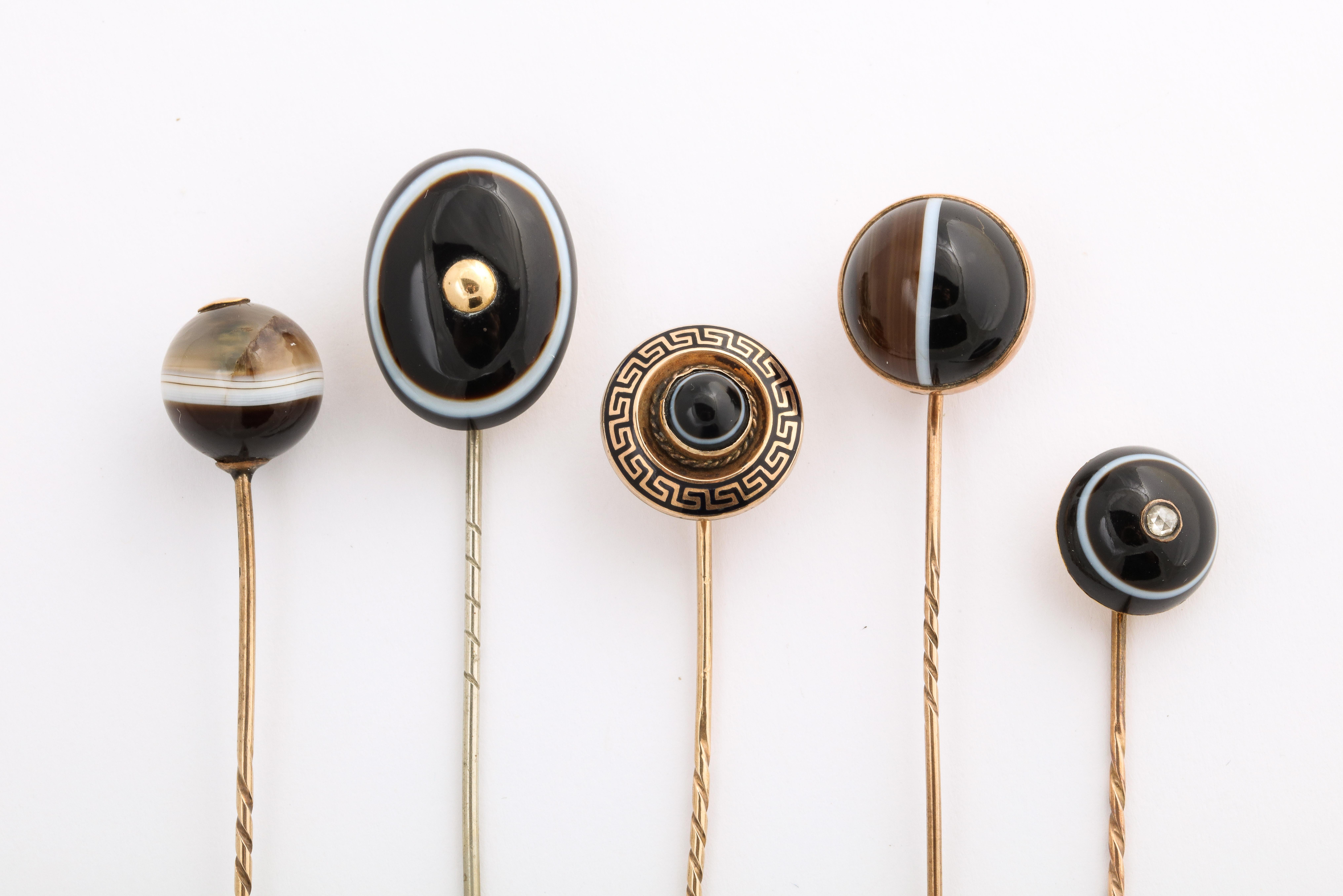 A Victorian gold stickpin collection, all in banded agate, is for sale as a group or as an individual item. Banded Agate makes a handsome contrast with clothing in any texture or color. All were made c. 1860 in England and all are in perfect
