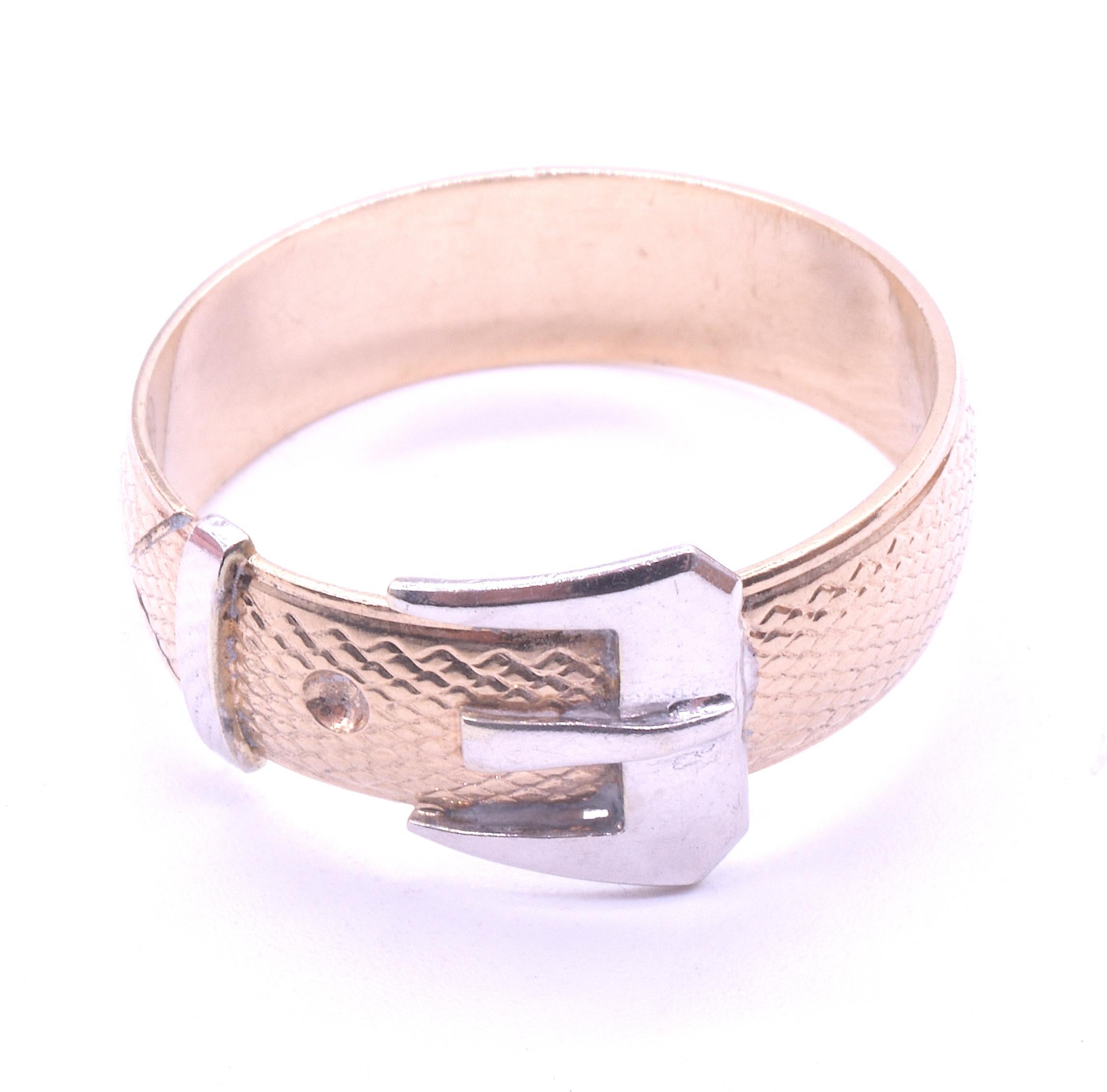 Large Victorian buckle ring in 9K but with a sterling silver buckle c1890.   The contrast of the two metals is sophisticated and smart looking. The interesting texture of the gold band has the look of shagreen, an interesting detail (the Victorians