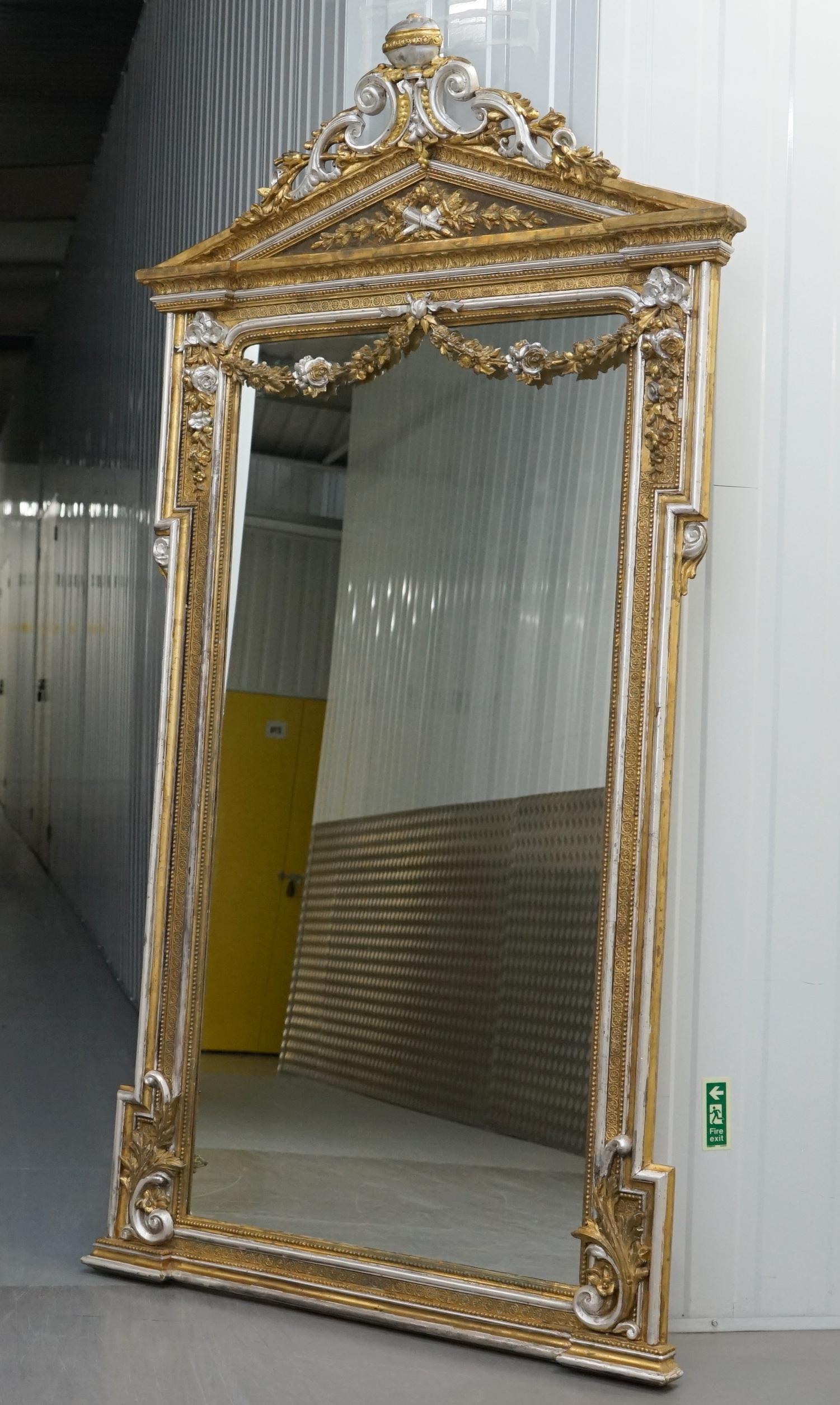 We are delighted to offer for sale this stunning Victorian hand carved wood with gold & silver leaf painted full-length Pier mirror

A very ornately decorated and carved piece, ideally wall mounted but can be free standing as well. The timber