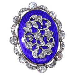 Bague de cocktail victorienne en or et émail bleu, sertie d'un diamant de taille ancienne, vers 1900