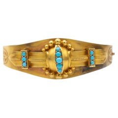 Brazalete victoriano de oro de altos quilates con turquesas, Gran Bretaña, 1850-1880.