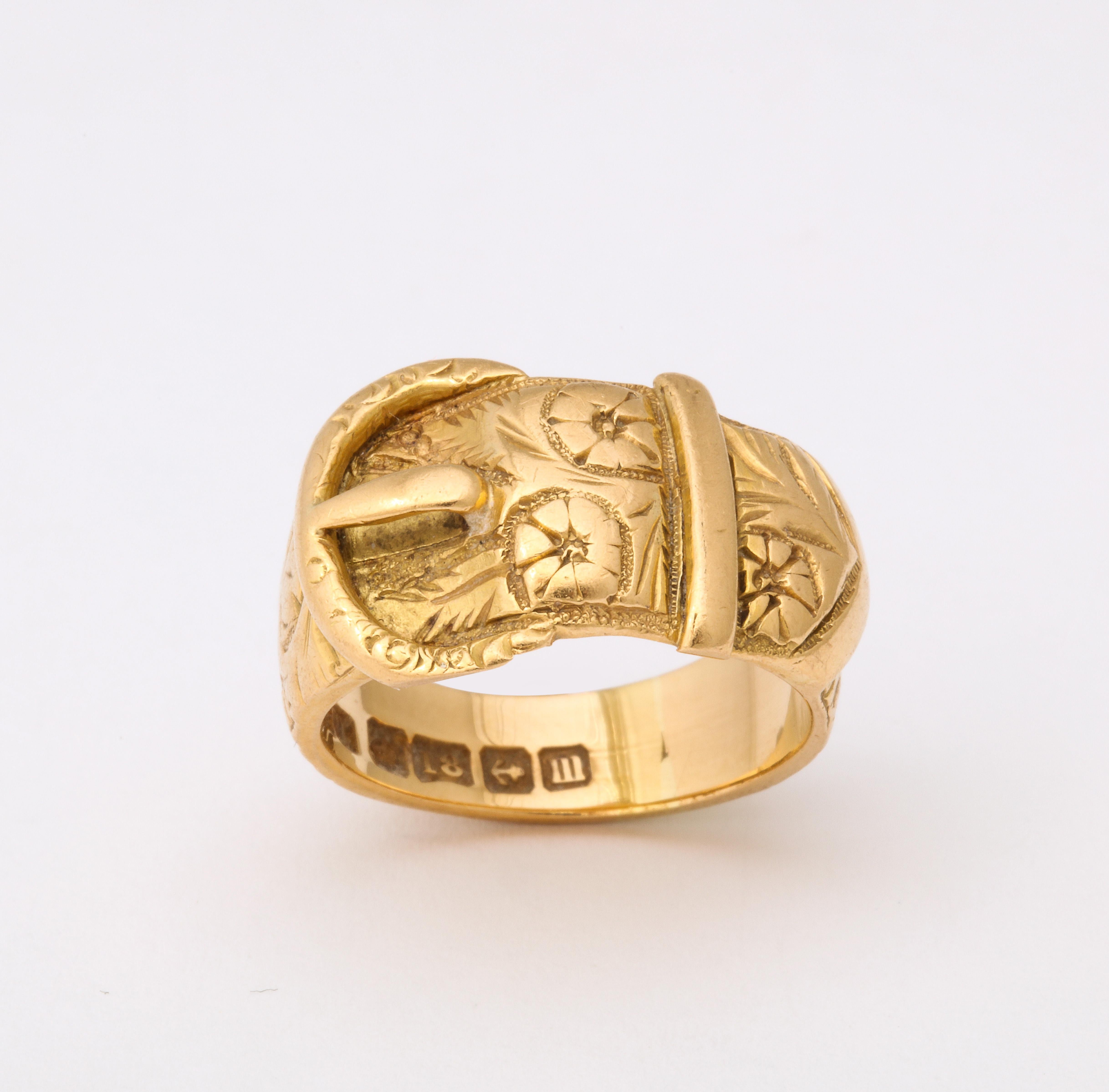 gold belt buckle ring meaning