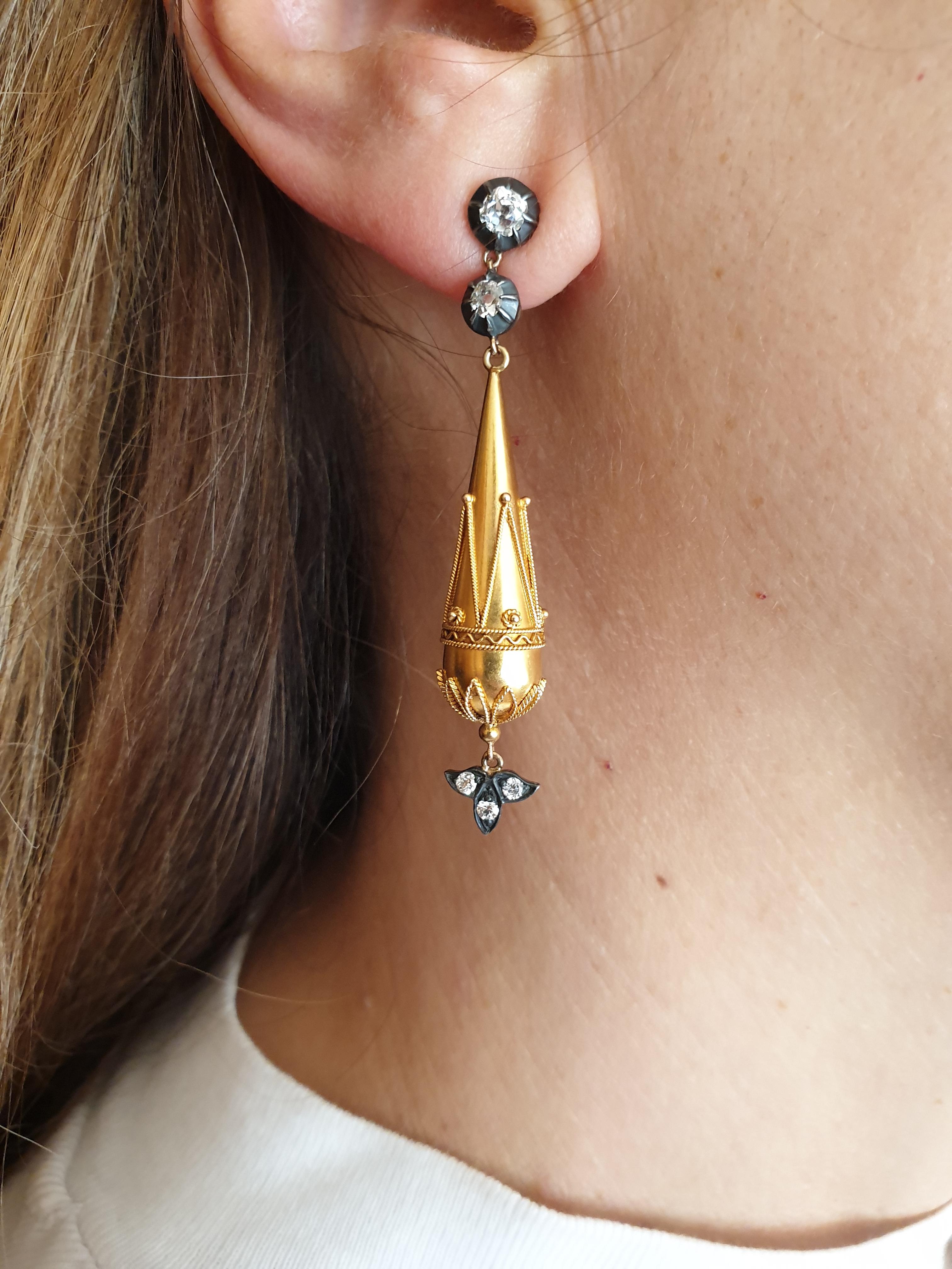 Victorian gold earrings recently mounted with old cut diamonds in a silver topped gold mounting.