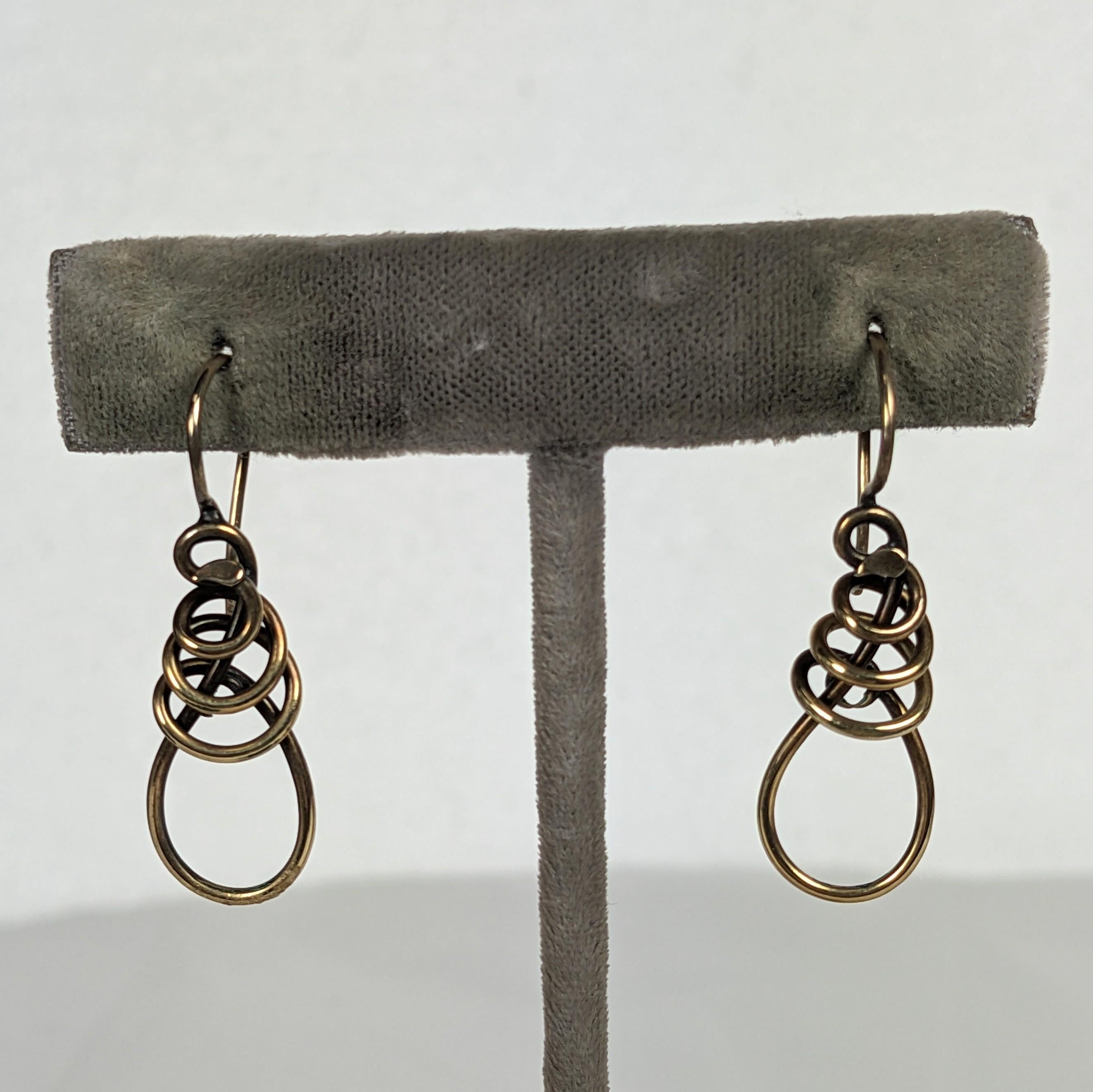 Victorian Gold Filled Vine Earrings from the late 19th Century. Original ear wires on looped vine design which climbs upward. 1880's USA. 
1.5