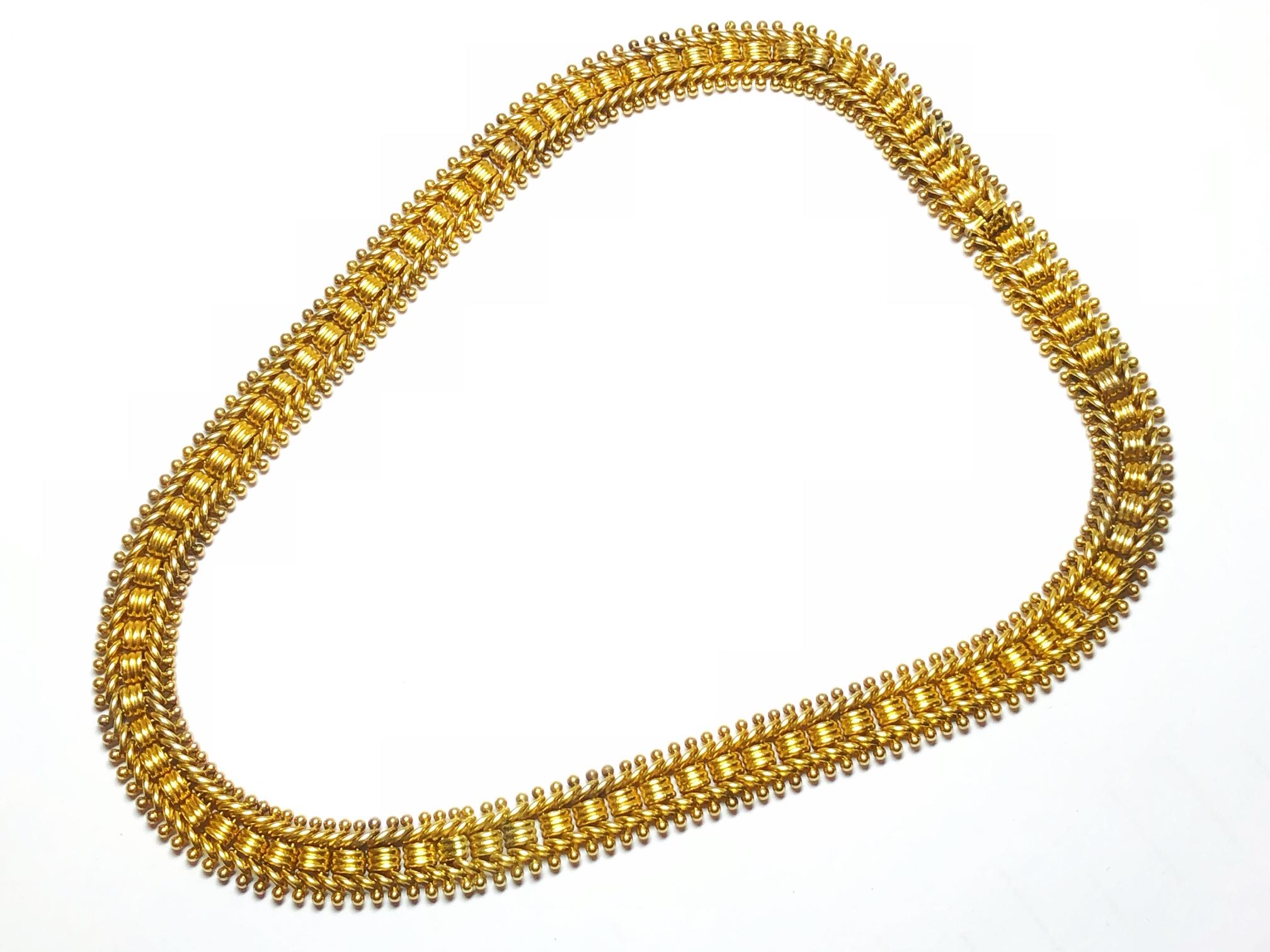 A Victorian gold choker necklace, of woven design, with a concealed clasp, circa 1875, length approximately 36cm
