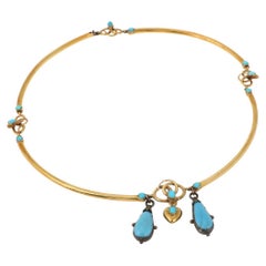Victorian gold necklace with turquoises and snake motif, mid 19th century.