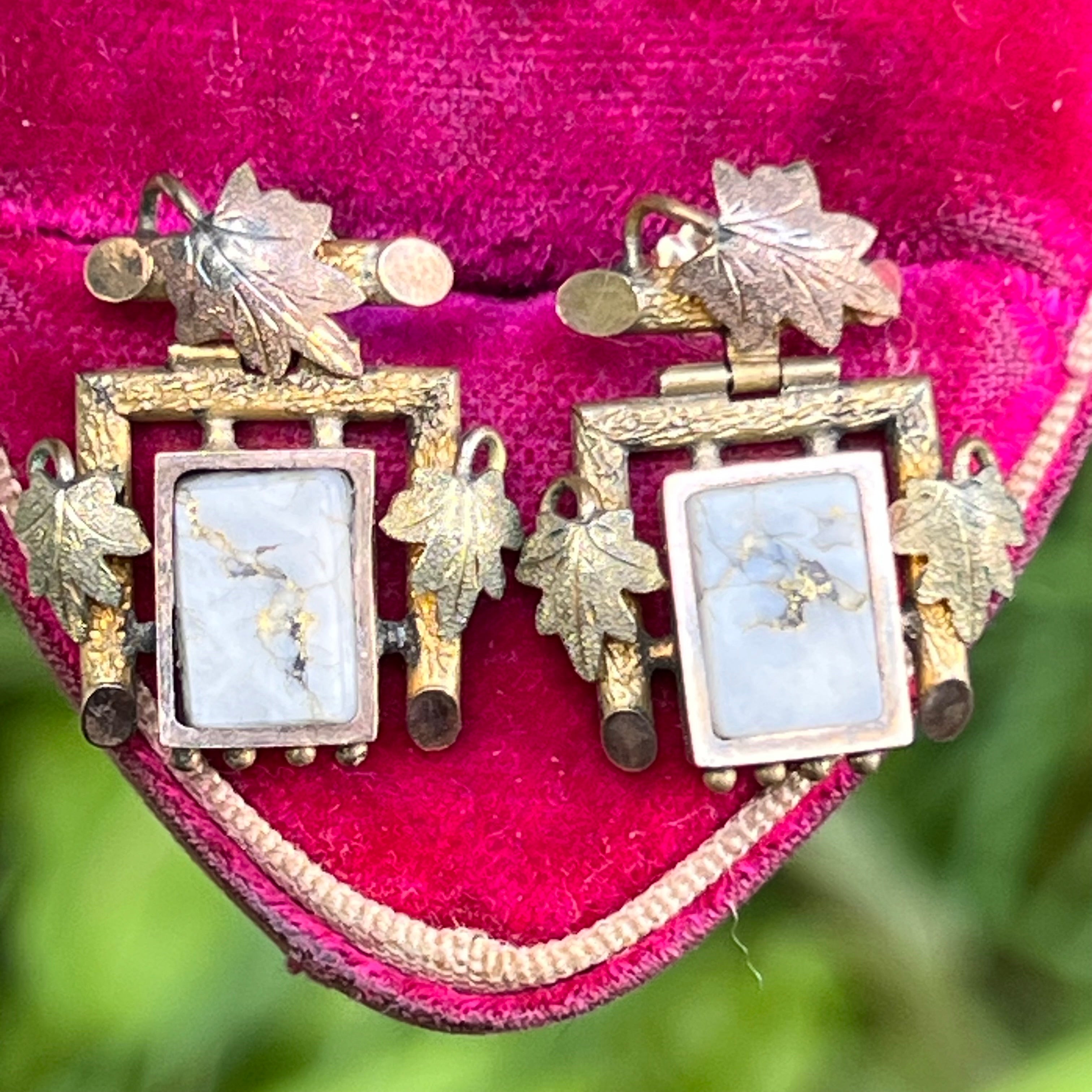 Highly collectible antique Victorian dangle / drop earrings featuring a square gold quartz stone set on an open back dual tone ( rose gold and yellow gold ) gold setting . Earrings are for pierced ears .
Unsigned /unmarked

Dates late 19th to early