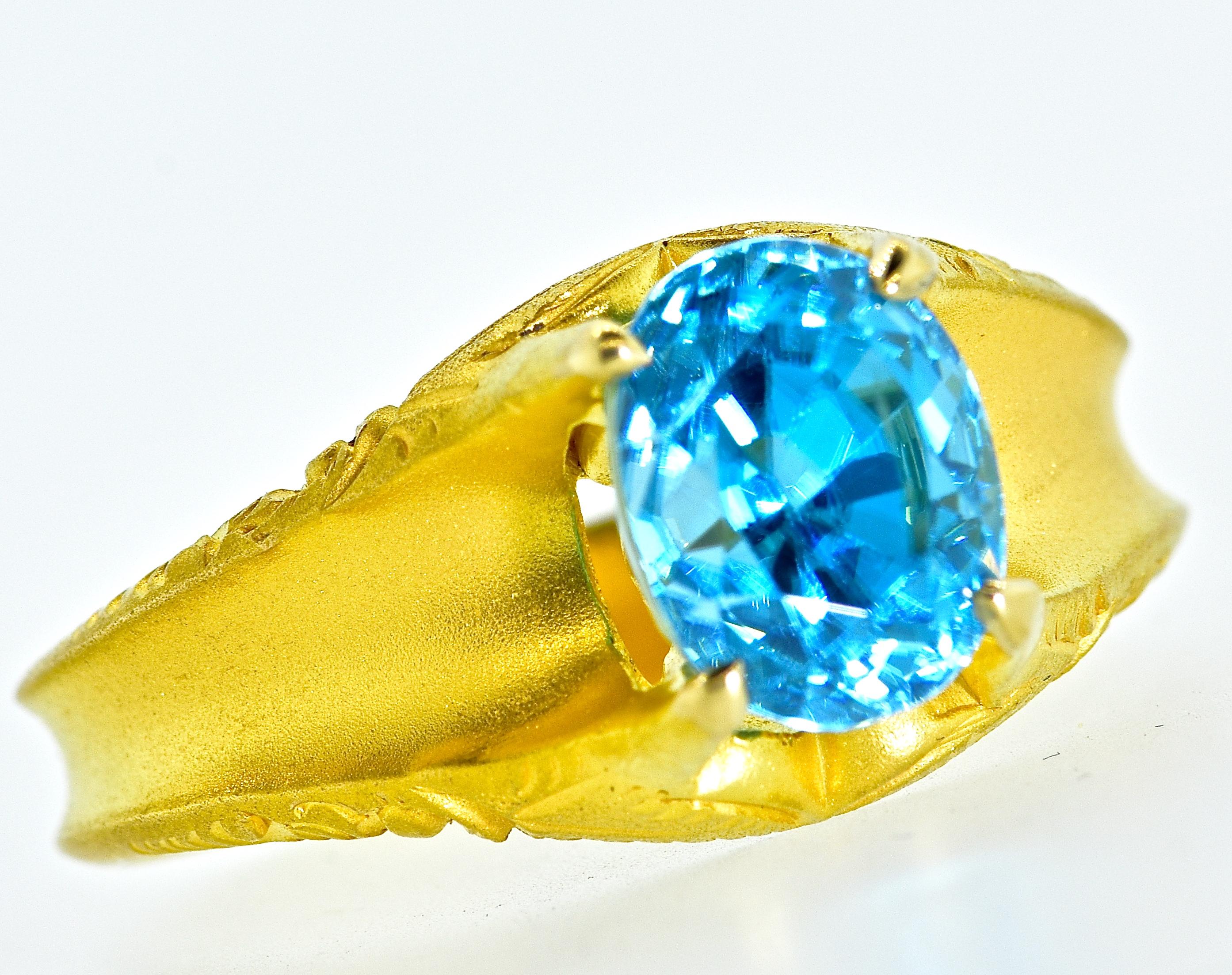 Victorian 18K gold ring centering a very fine natural blue zircon weighing an estimated 7.50 cts.  This oval stone is intensely brilliant and a vivid blue color and free of inclusions. This Victorian ring is from the last quarter of the 19th