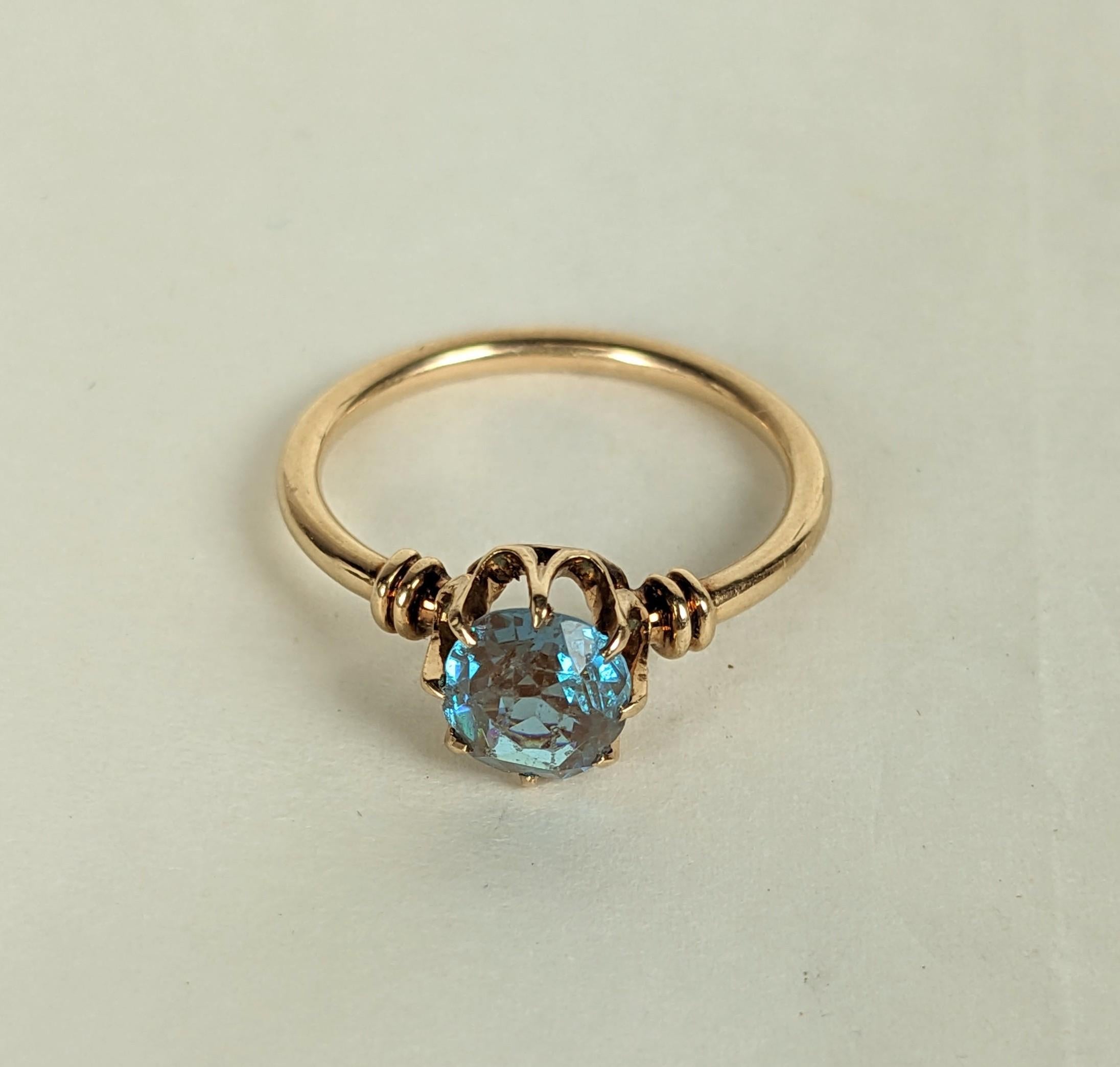 Highly Unusual Victorian Gold Saphiret Solitaire Ring from the late 19th Century set in 14k gold. High crown setting on main saphiret crystal stone. Unusual to find this color change crystal set in gold in the period. Size 5.25 USA. 1880's.  