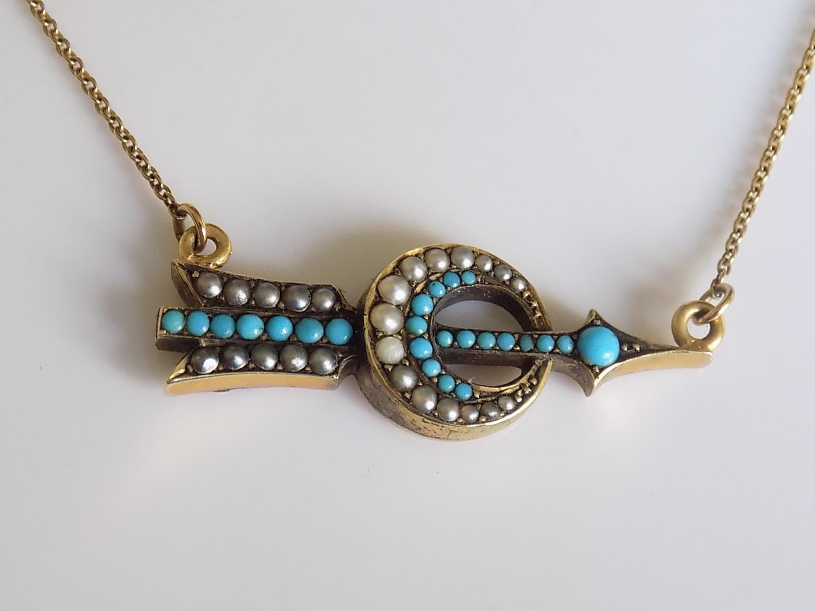 This is a Victorian 18 Carat Yellow Gold, Turquoise and split seed Pearl brooch converted to the necklace. The necklace made in shape of Arrow and Crescent ( Target ) on 9 Carat Gold chain. A rare and eye catching necklace.
Pendant 35mm x