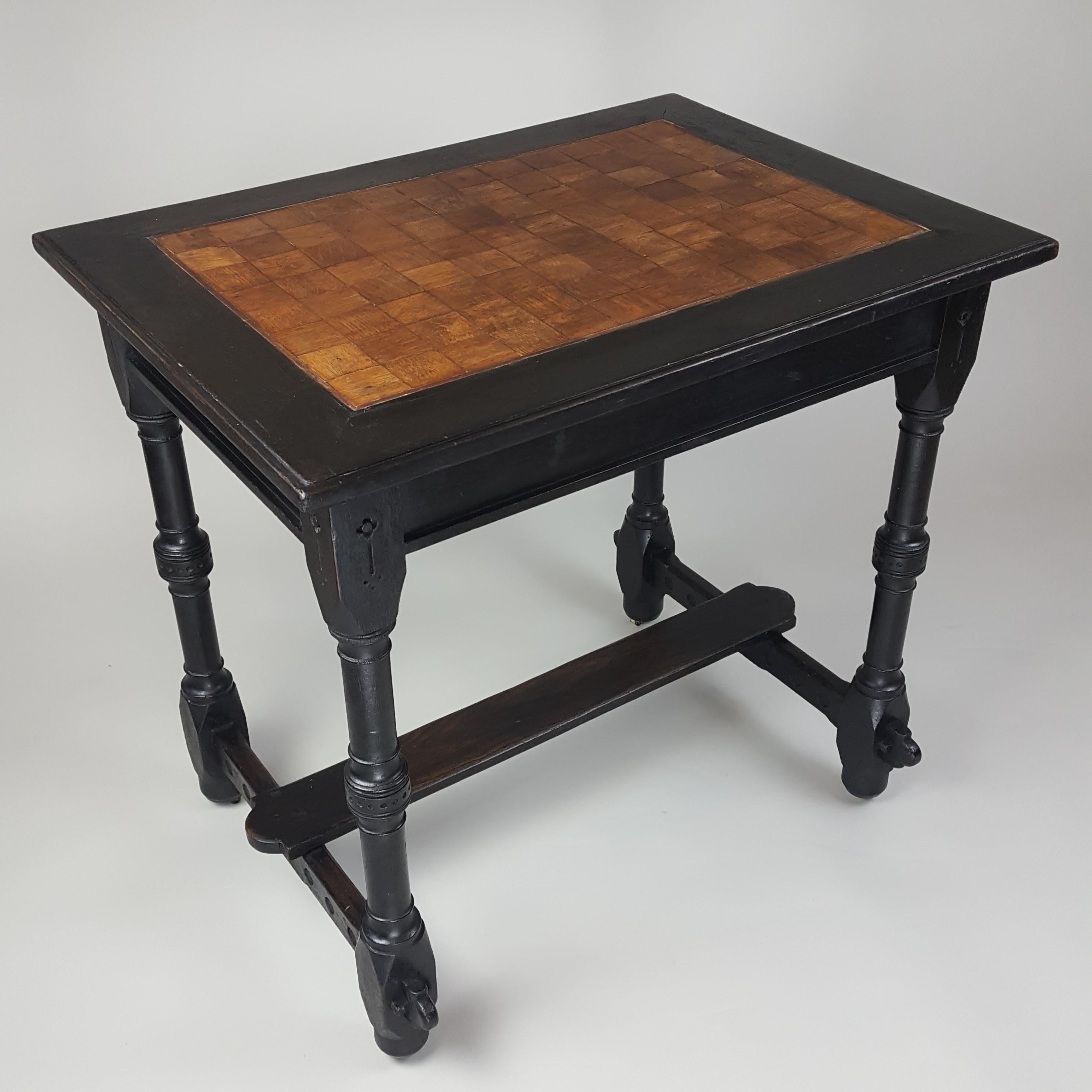 Gothic Revival Victorian Gothic ebonised and parquetry table. For Sale