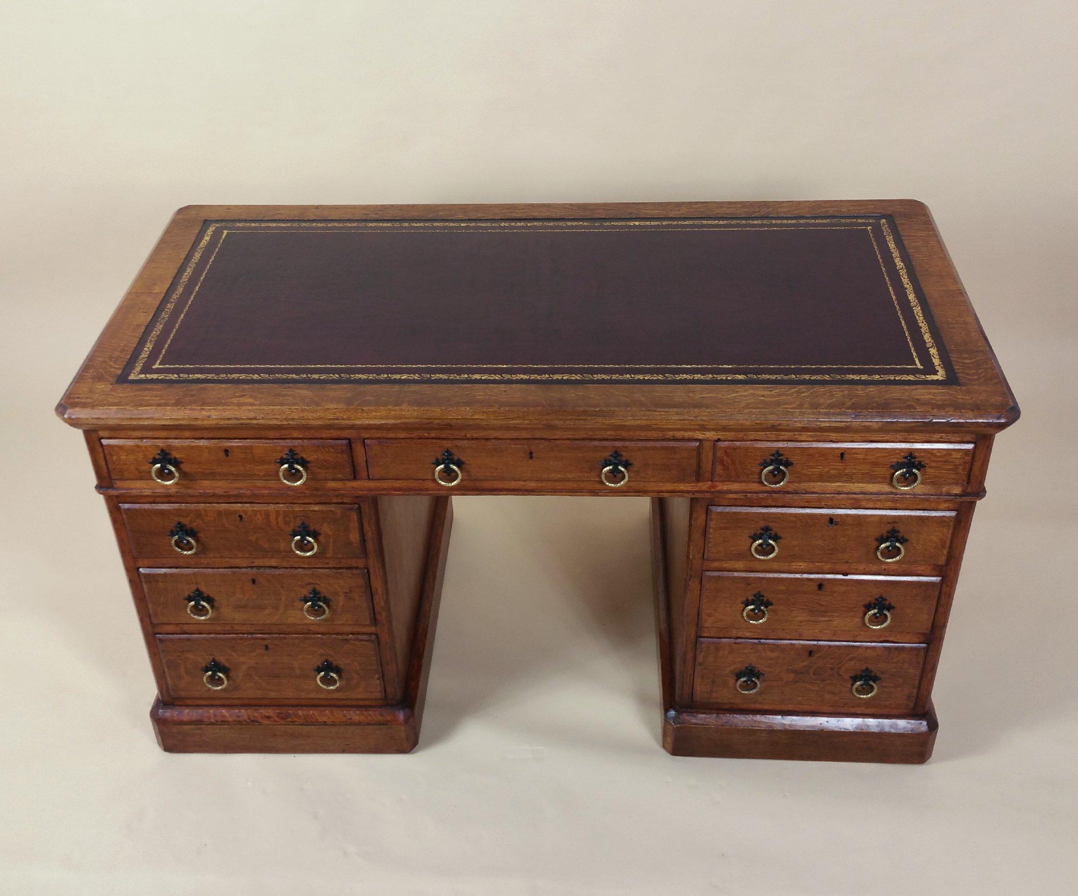 Victorian Gothic Oak Nine-Drawer Pedestal Desk with Leather Top For Sale 4