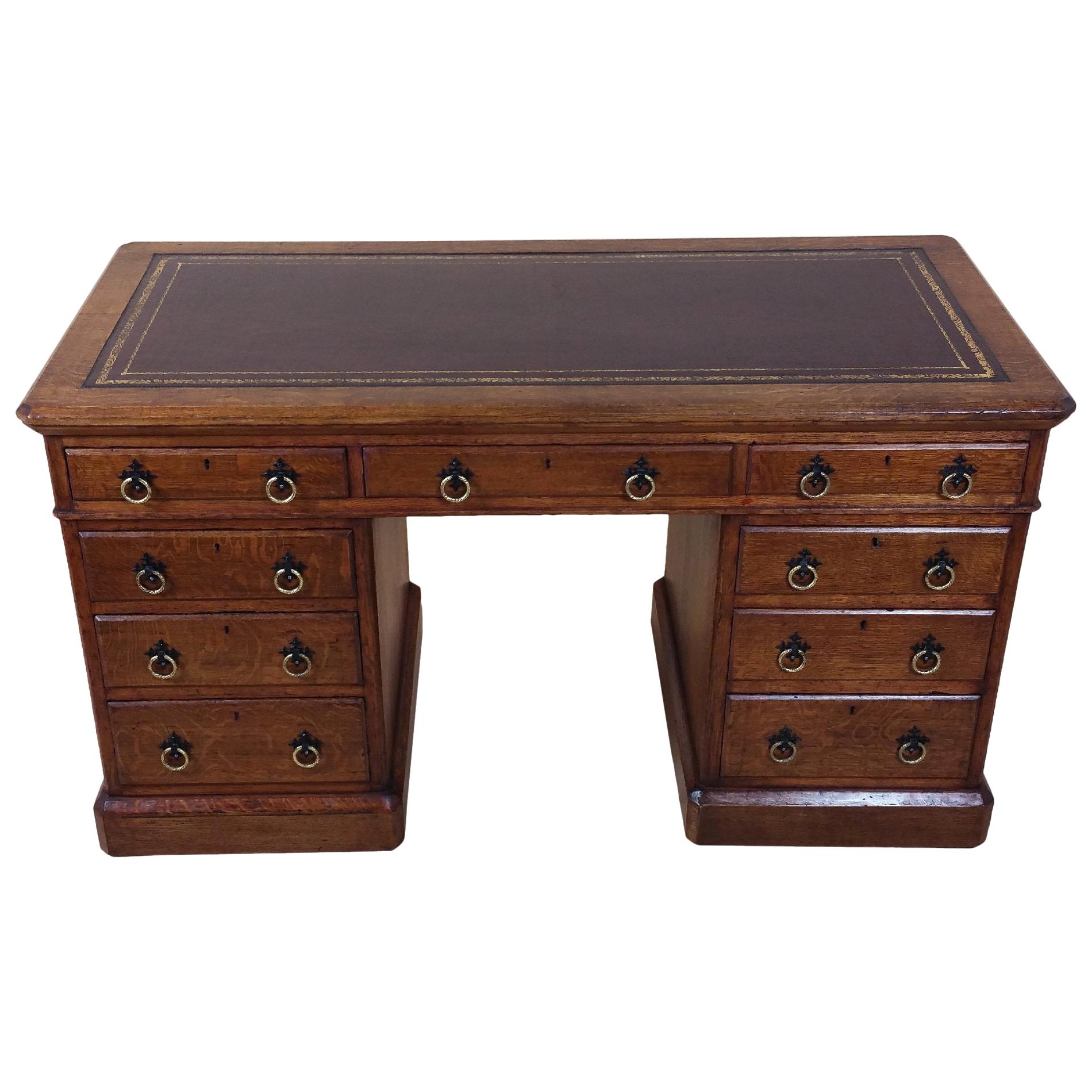 Victorian Gothic Oak Nine-Drawer Pedestal Desk with Leather Top For Sale