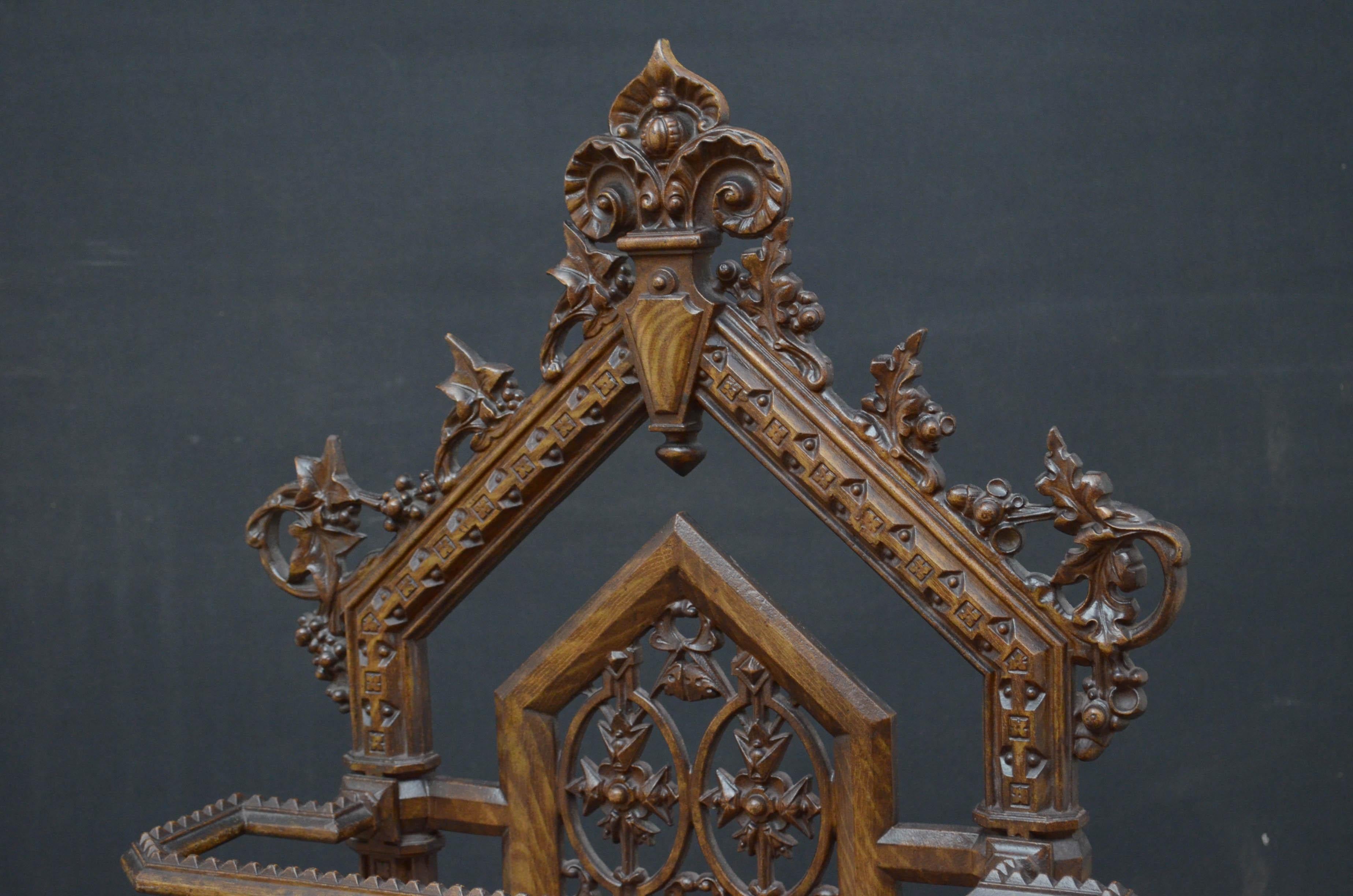 Sn4573 stylish Victorian Gothic Revival cast iron hall stand with simulated timber grain and distinctive pierced decoration of stylized plant forms, Gothic and geometrical elements combined in a manner typical of Dresser’s work. All in excellent