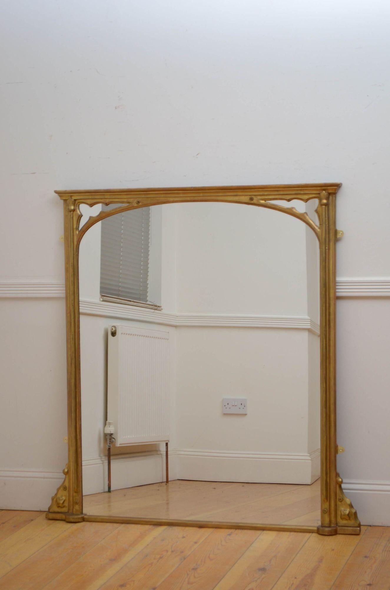 St021 Victorian Reformed Gothic gilded wall mirror, having replacement glass in moulded and gilded frame with Gothic design decorative motifs. All in home ready condition. c1880
H50.5