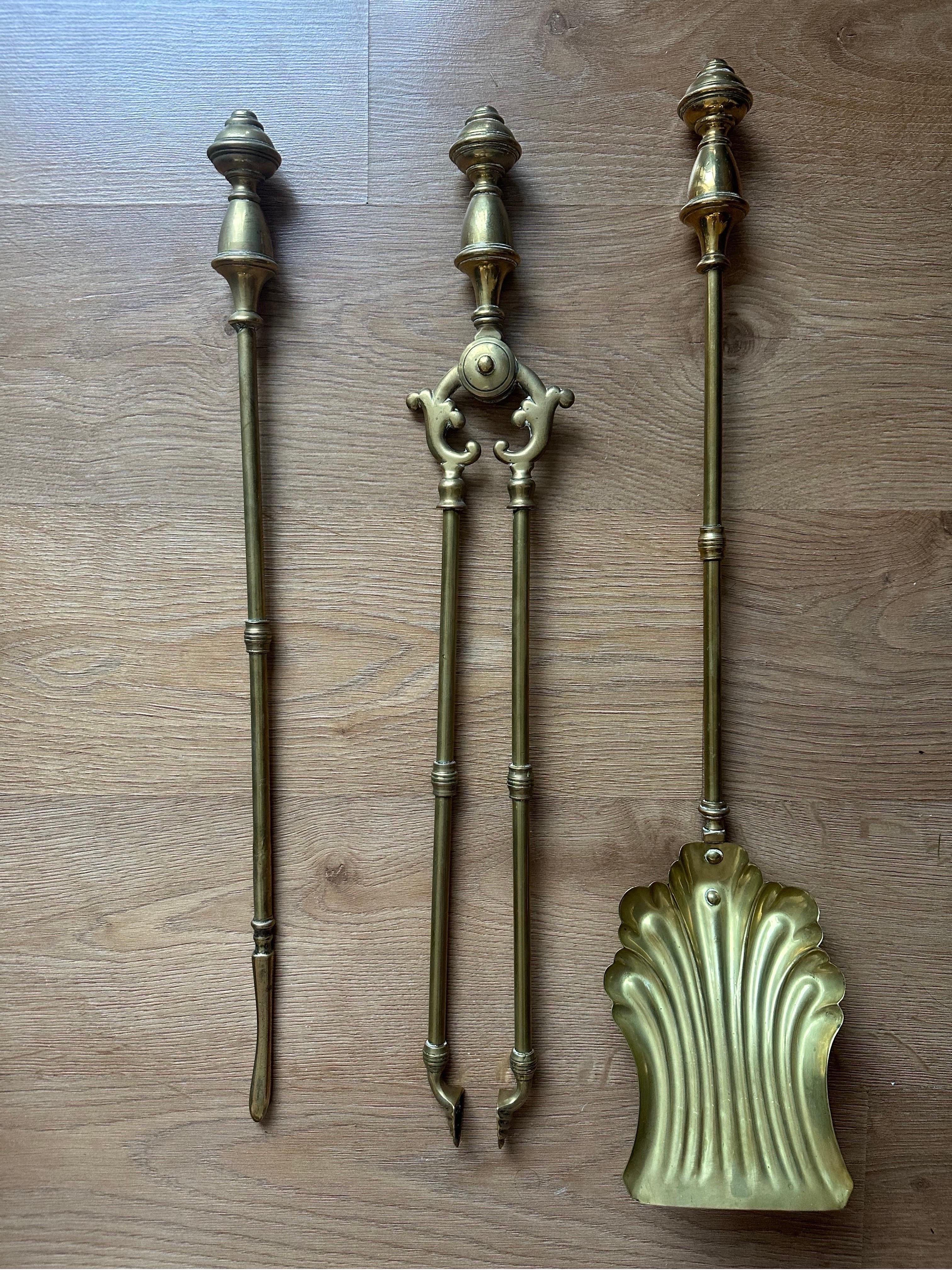 A beautiful set of antique Victorian solid brass fire companion tools. The superb set is solid brass, with beautiful twirl top motif. Beautiful patina throughout the set. With matching the elegant yet powerful impression the set provides. This is