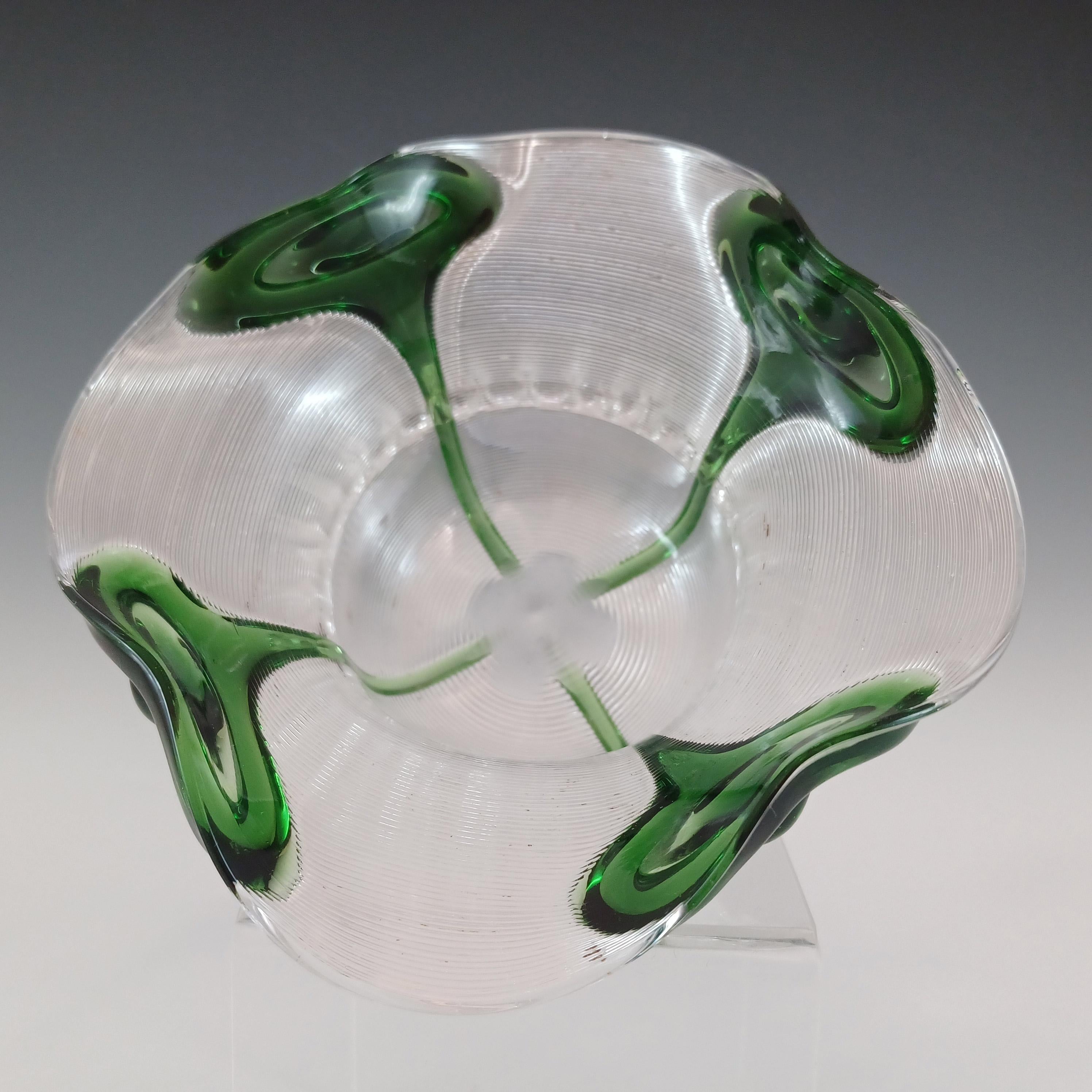 A beautiful Victorian clear glass machine threaded bowl with applied green 'peacock eye trails' decoration, the design is also known as 'Cairngorm'. Designs such as this were produced by several factories from England, most notably Stuart & Sons,