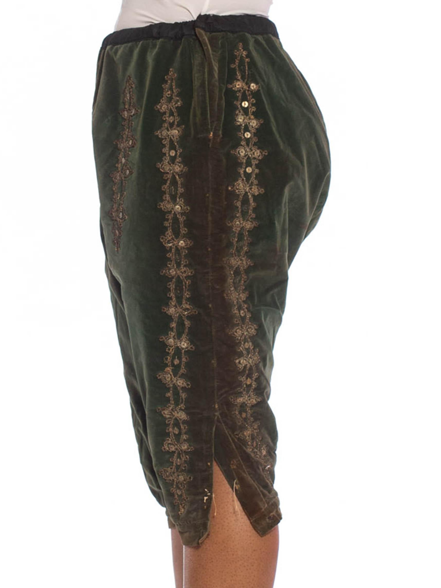 green metallic pants