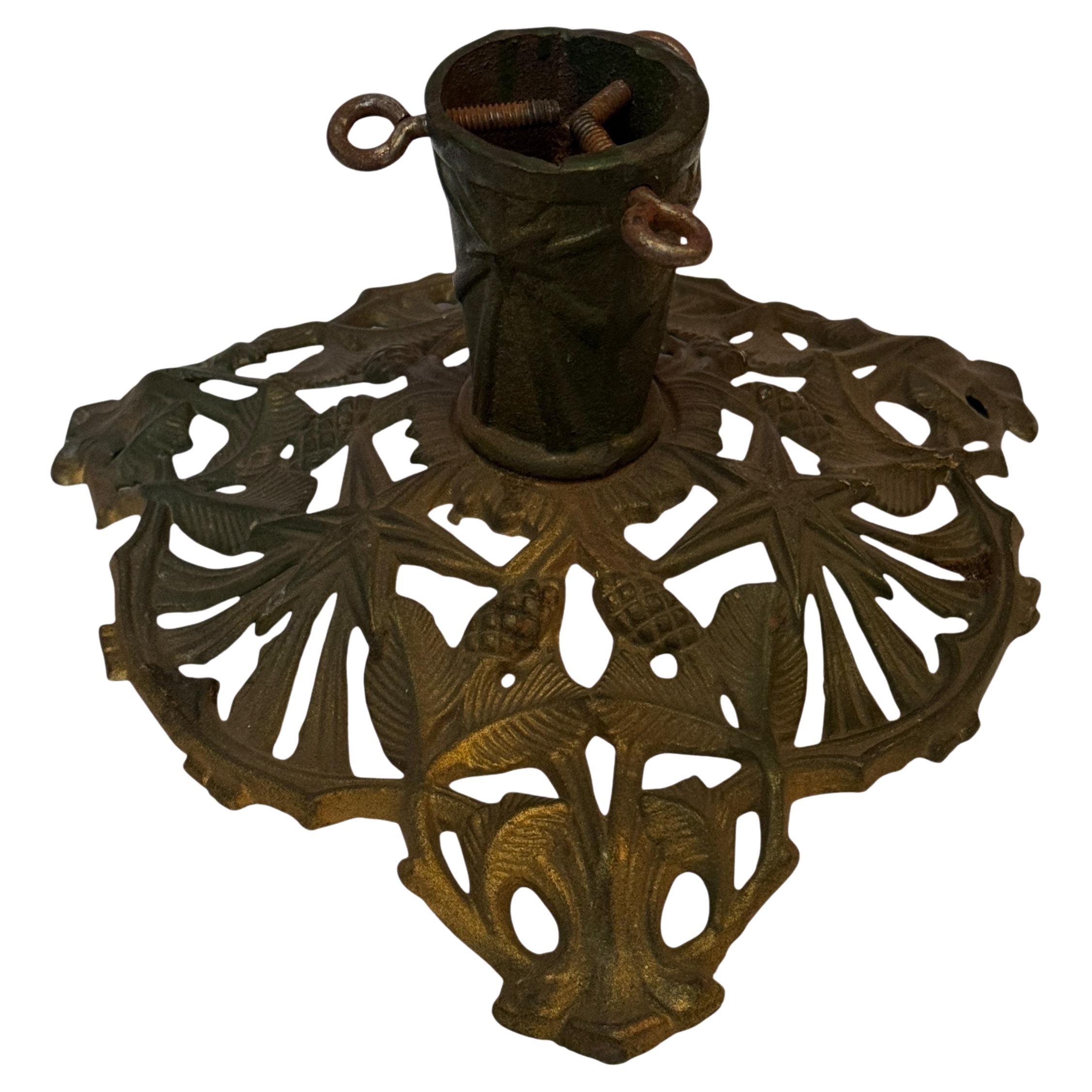 This beautiful Art nouveau green and golden color cast iron Christmas tree stand, was made in Germany, in the 1910s. A nice addition for your Christmas decoration. It holds a stem up to 1.75 inches in diameter. Looks great with your feather tree.