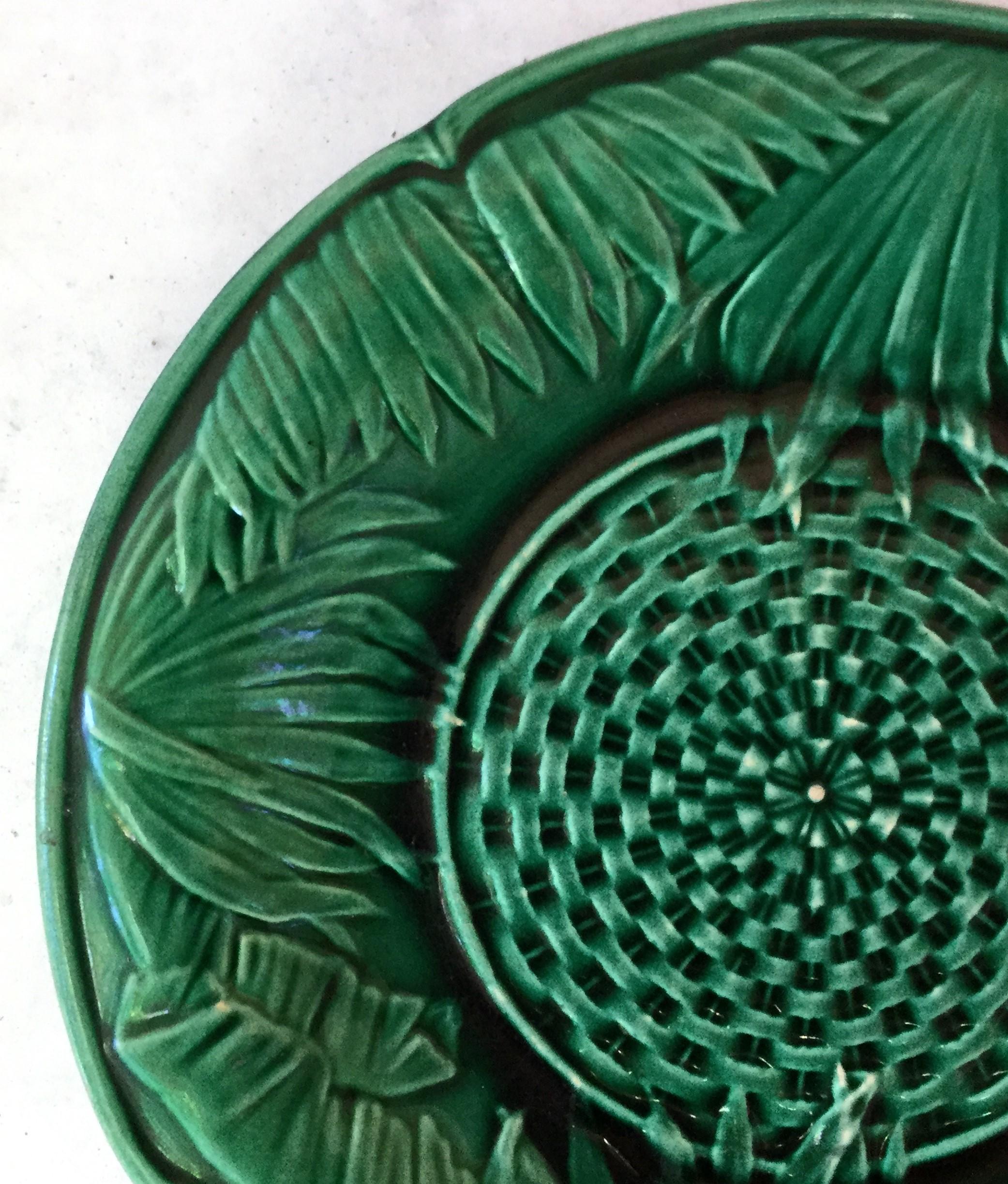 Victorian green Majolica palm leaves plate, circa 1880.
Basketweave on the center.