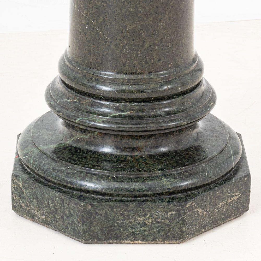 Victorian Green Serpentine Pedestal, late 19th century, with a square revolving top on tapering column and octagonal shaped plinth. 35