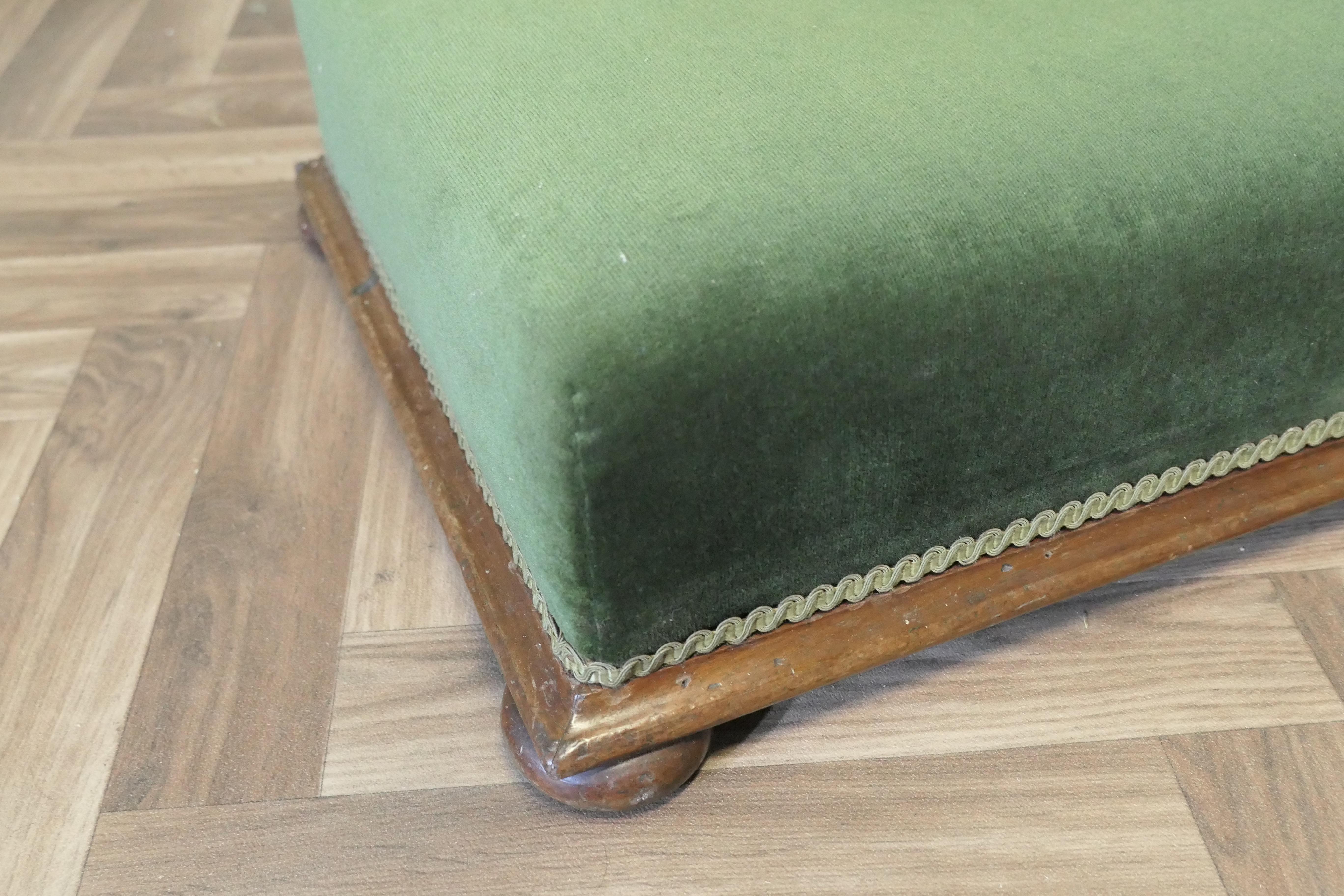 Victorian Green Velvet Foot Stool

A Lovely piece, this Victorian stool is Square, it stands on neat bun feet and has green velvet upholstery 
The stool is an original 19th Century piece and was probably used as a bed step for a high antique bed, it