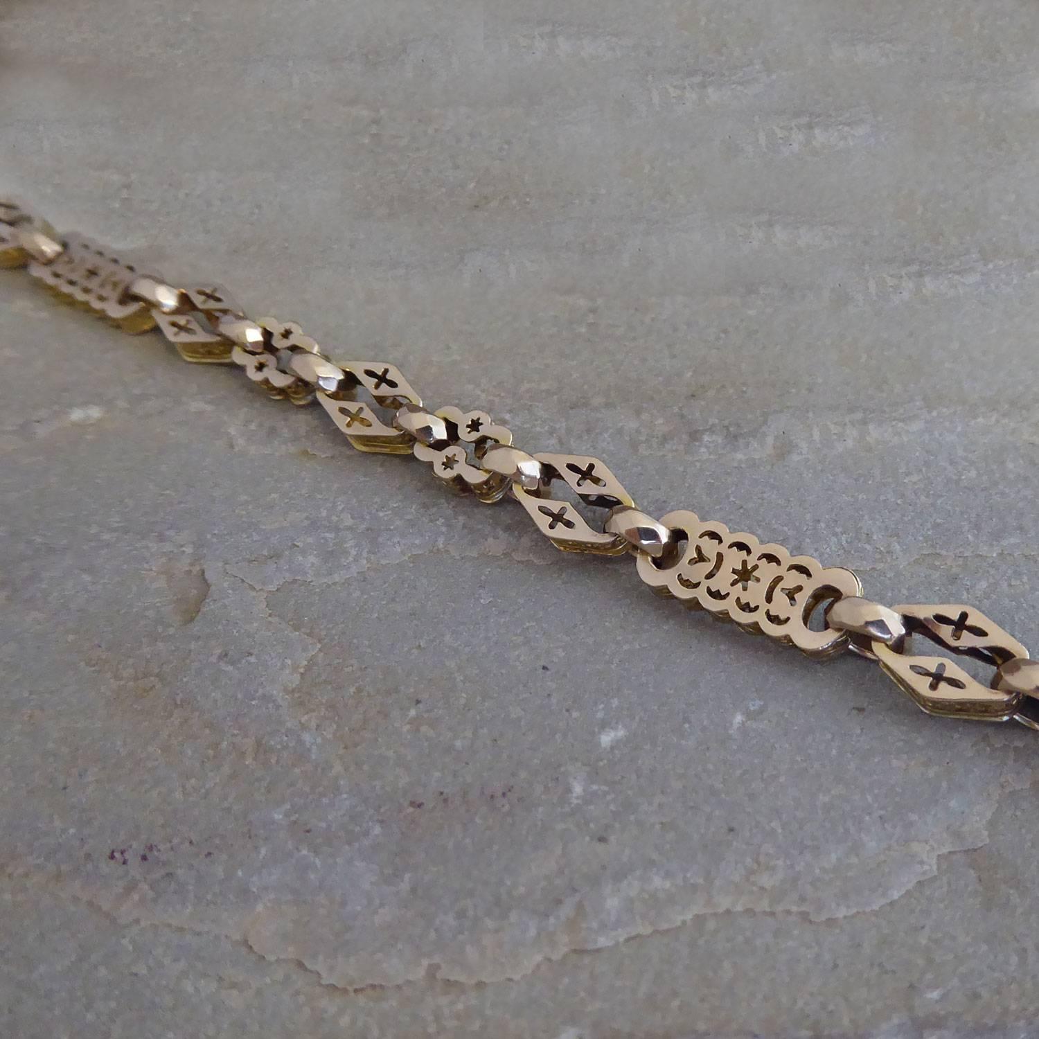 An antique fancy link bracelet repurposed from a Victorian Albert watch chain ( we also have the other half should you wish to purchase a complete watch chain). 

Created from a mixture of three different patterned fancy links: one style in a