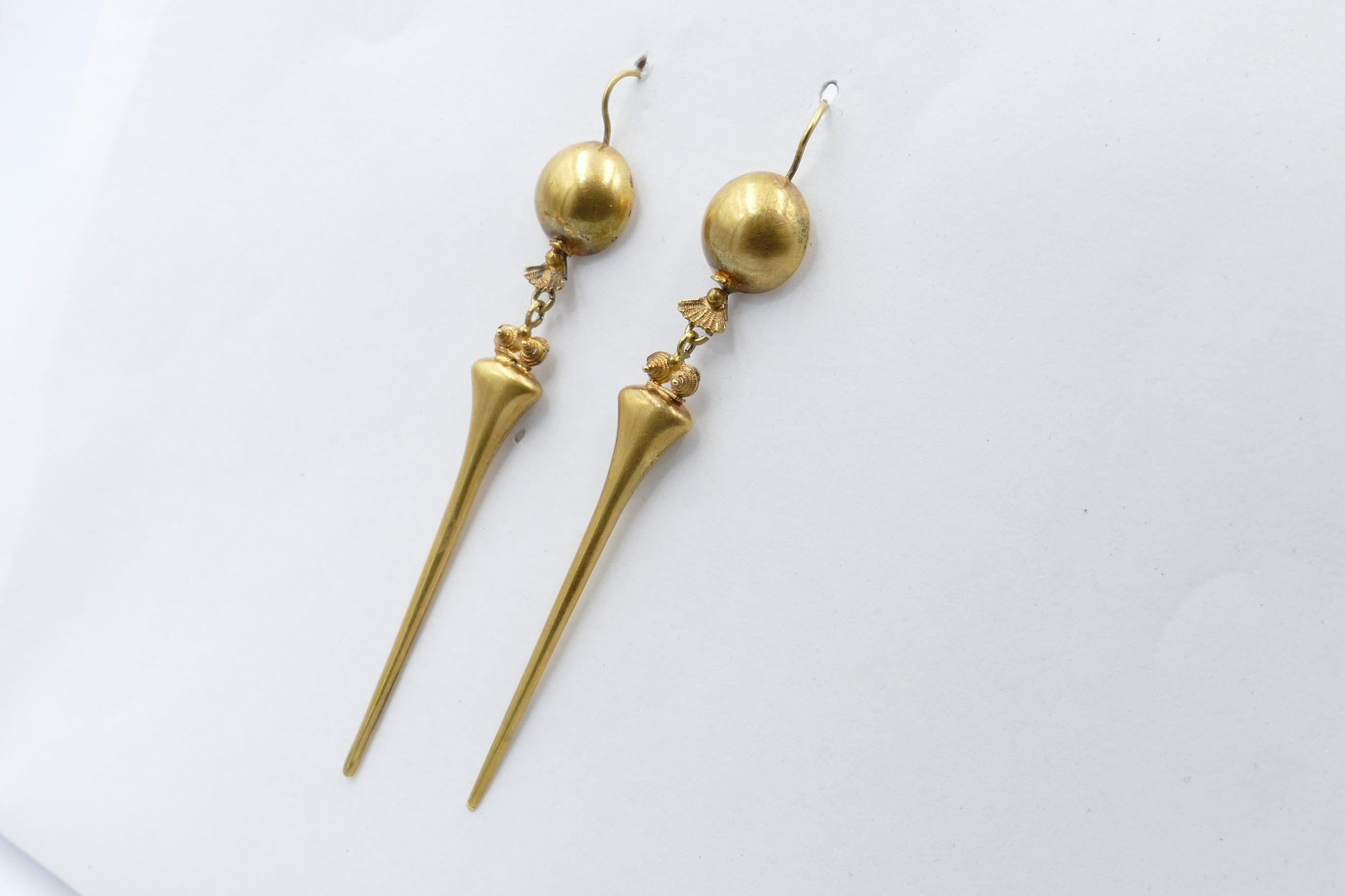 Lovely & Long! This set of  Antique Earrings is very well preserved for age.
They feature a ball top with a long gold hang under.
Approximately 5/6cm in length and in really good condition for the age.
They weigh 3.95 carats
Method of manufacture -