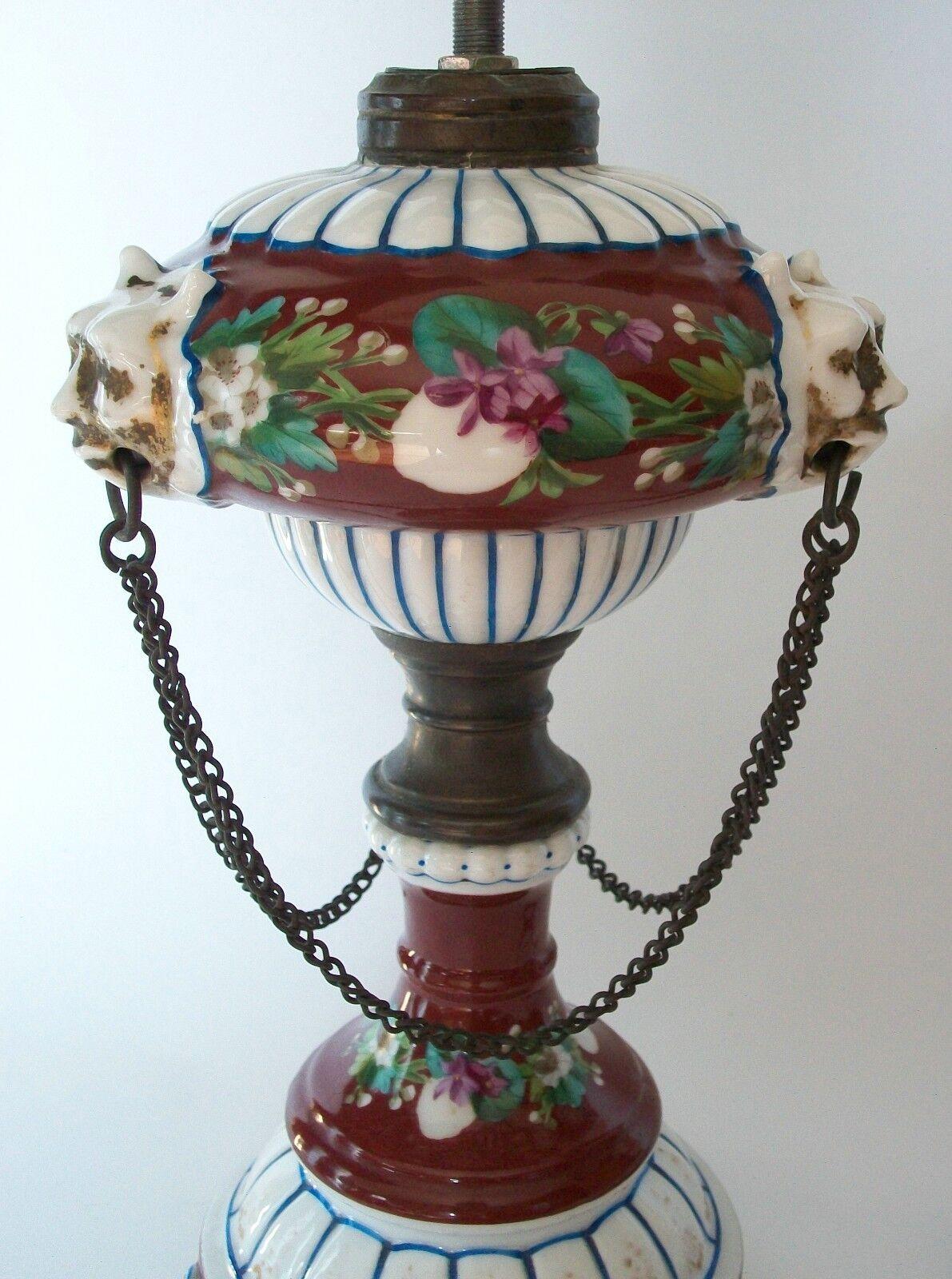 Victorian Hand Painted Ceramic Oil Lamps with Chain Swags & Lion Masks, C.1850 In Good Condition For Sale In Chatham, ON