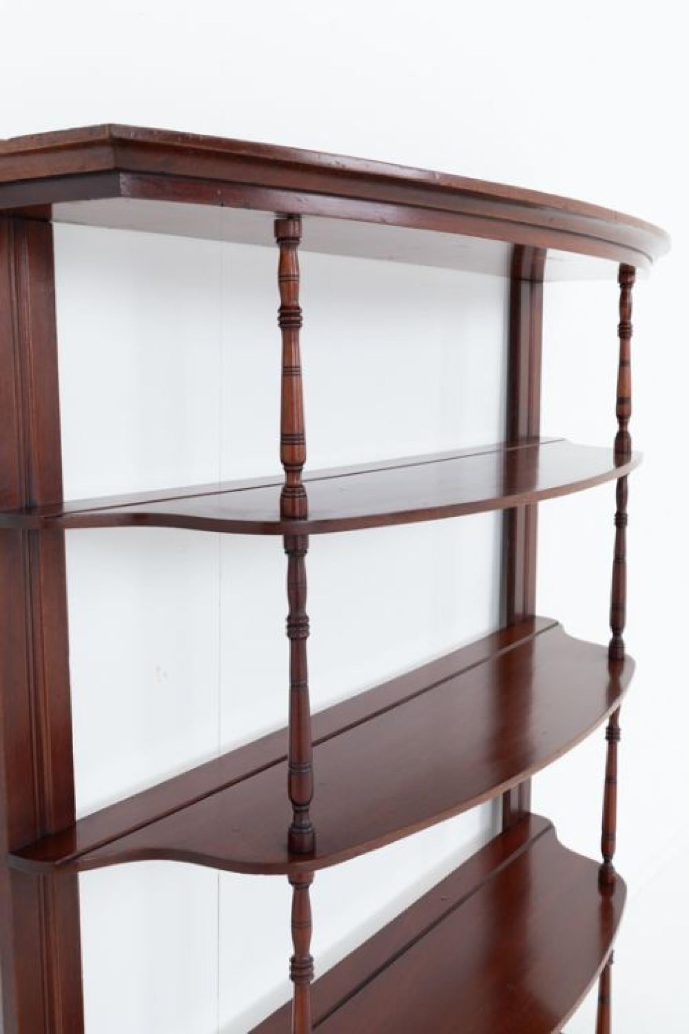 Victorian mahogany hanging wall rack.
This rack is of a bow form
Circa 1880
Featuring 4 shelves for display use
The shelves are supported by turned columns
Presented in good condition
Will ship to anywhere in the world - please get in touch for a
