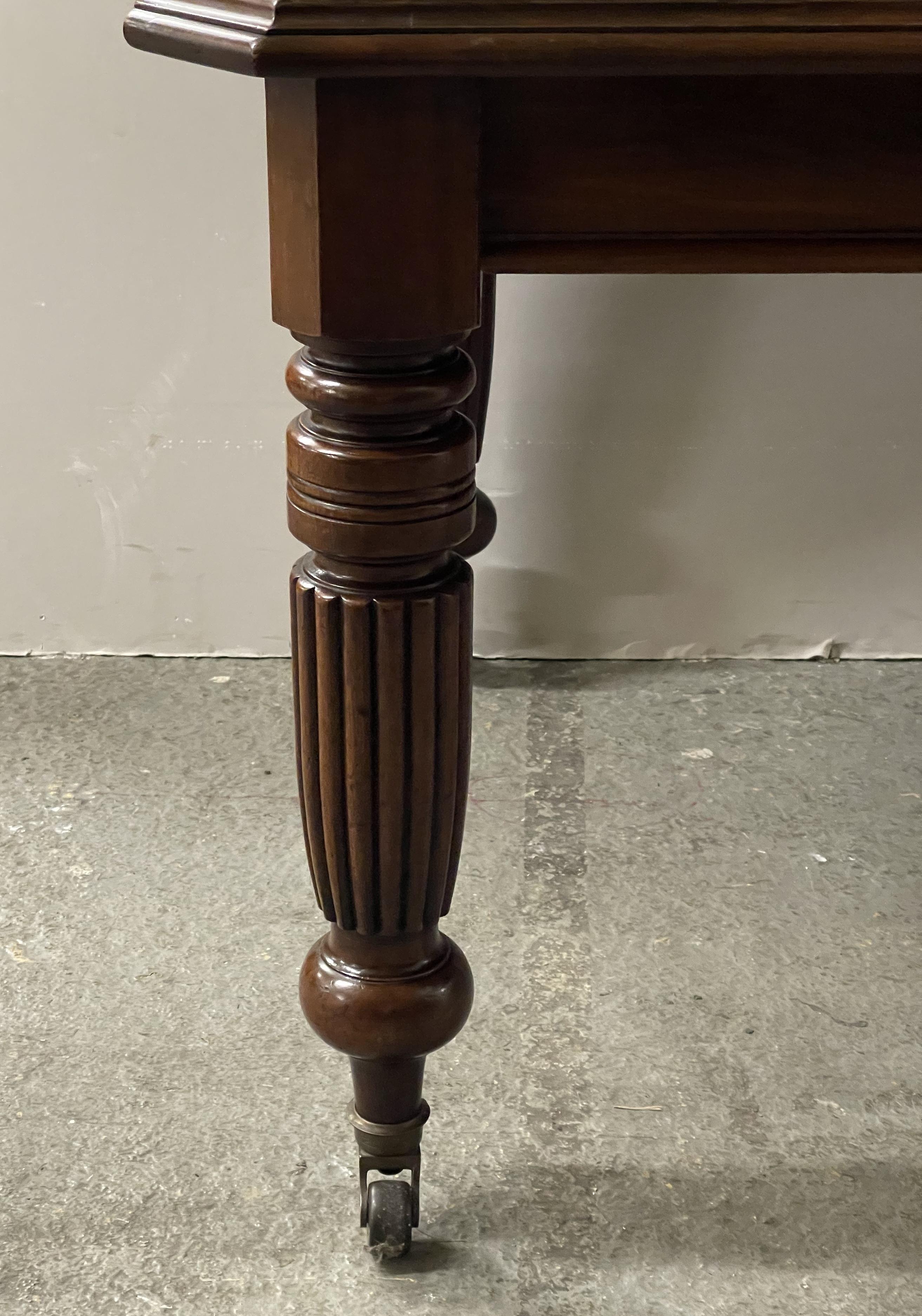 19th Century Victorian Hardwood Wind Out Extending Dining Table with Fluted Legs and Castors