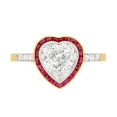 Antique Victorian Heart Shaped Diamond and Ruby Halo Ring, circa 1900s