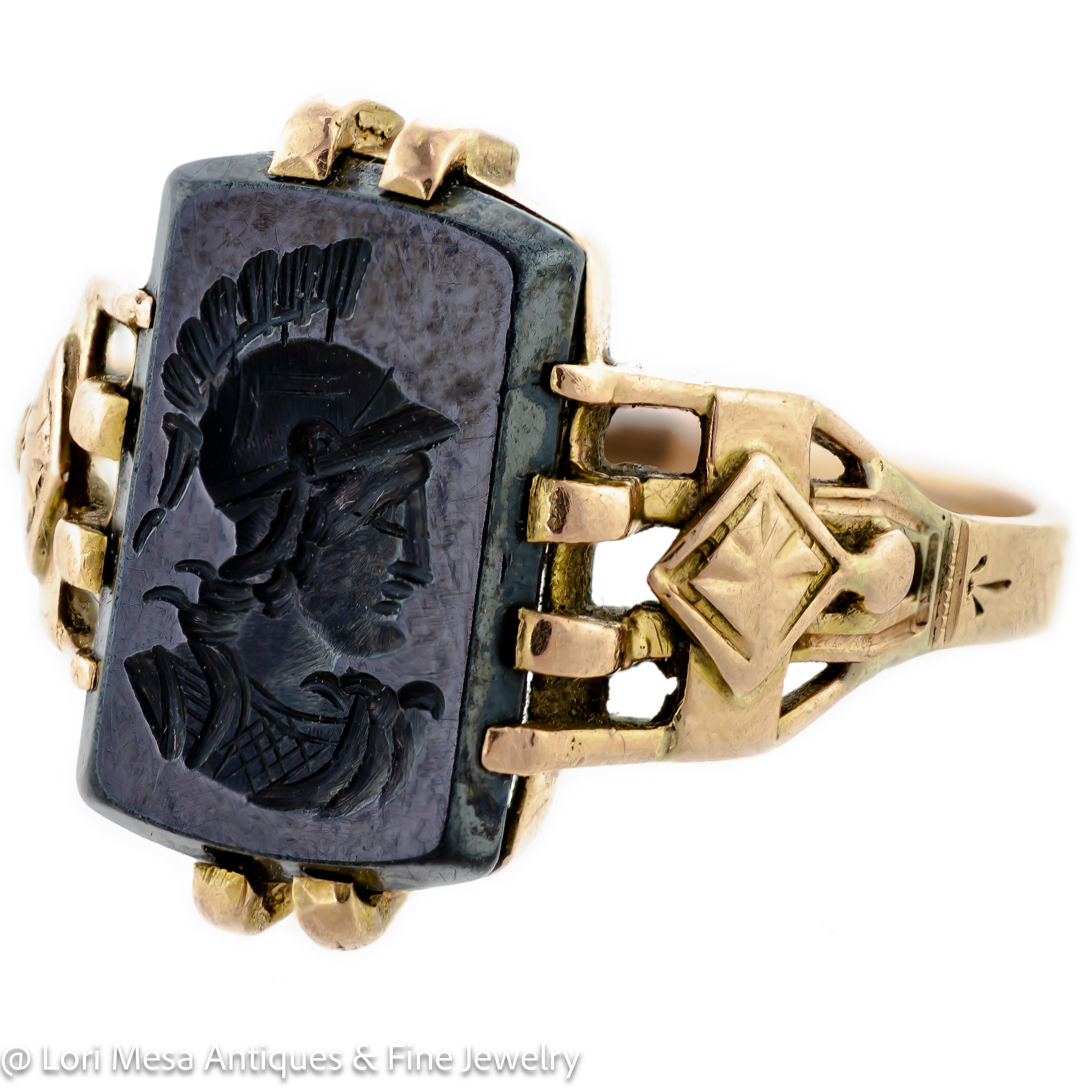 Victorian hematite intaglio and 14k yellow gold ring centrally set intaglio warrior in profile, measuring approx 11 1/2 x 8 mm engraved mount. 