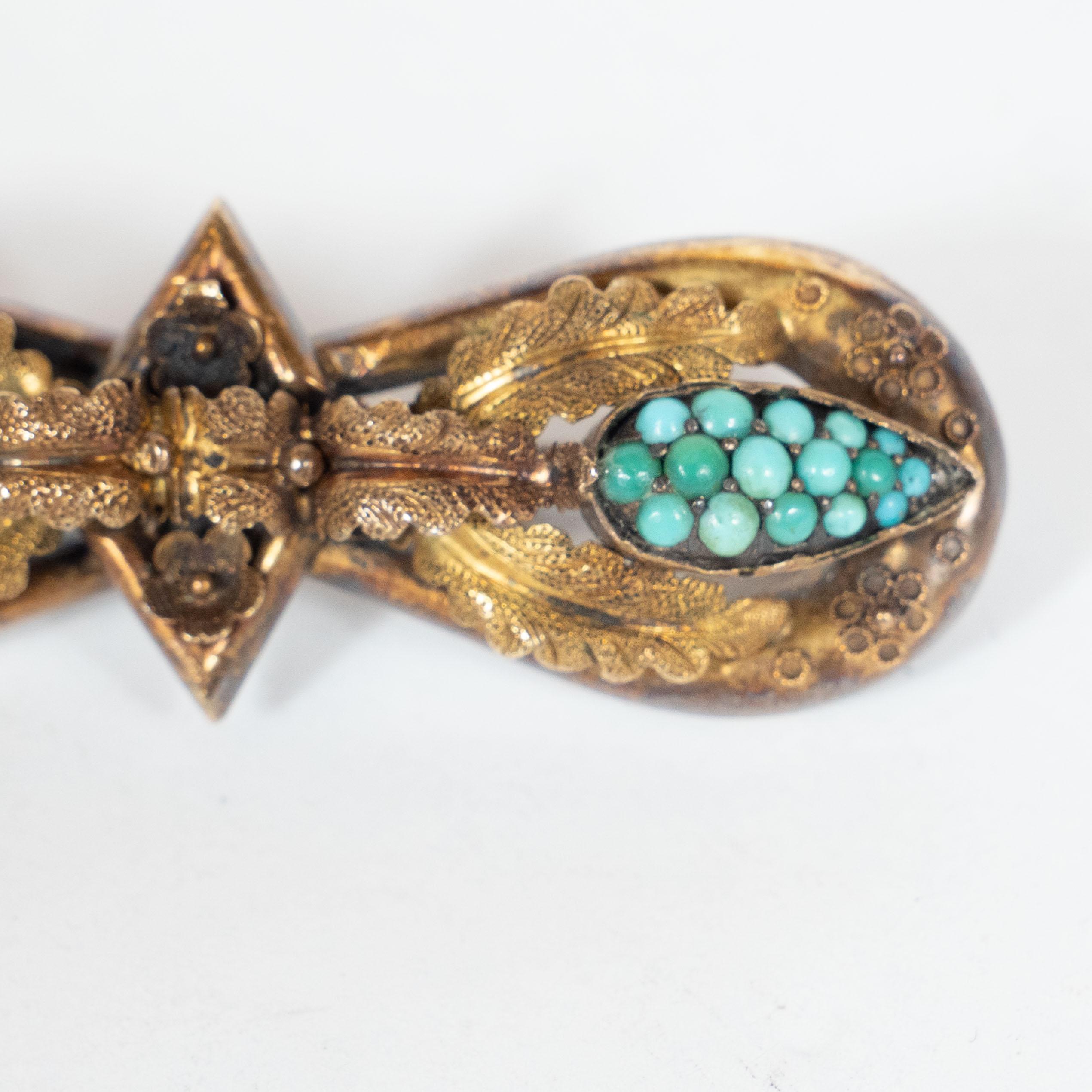High Victorian Victorian Hourglass Form 14 Karat Gold Filigreed Brooch with Inlaid Turquoise For Sale