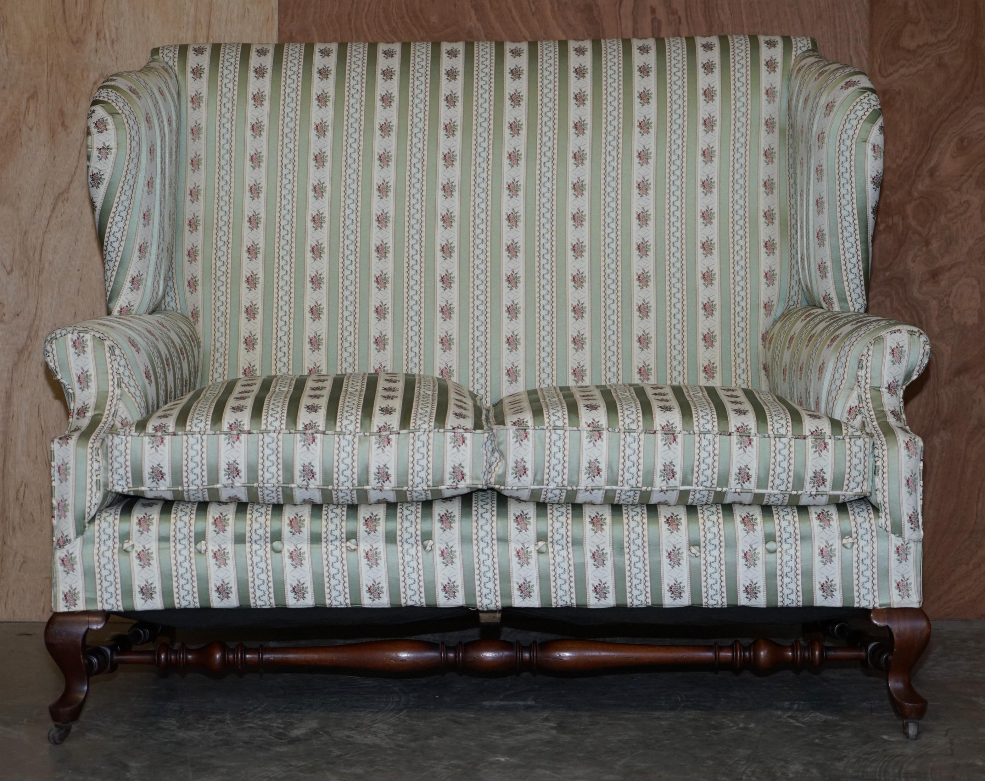 We are delighted to offer for sale this stunning original Victorian Howard & Son’s curved front double wingback sofa full stamped with H&S ticking

A truly stunning piece, in sublime condition, these double wingback sofas almost never come up for