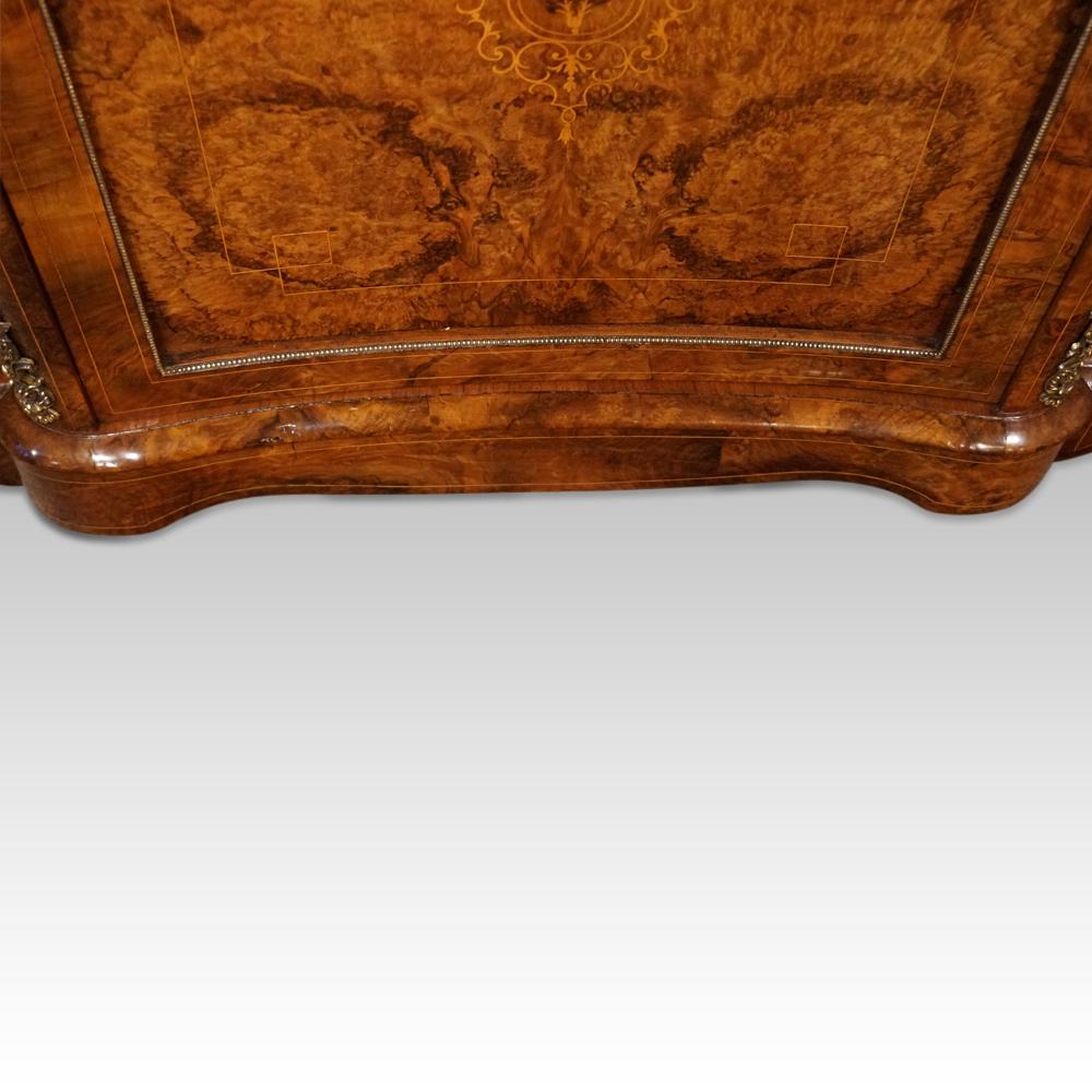 Victorian walnut inlaid credenza 
Here we are delighted to offer you a Victorian walnut inlaid credenza that was made circa 1870.
It is a rare design as it has a concave central door. Usually, the centre cupboard has a flat door.
Having the concave