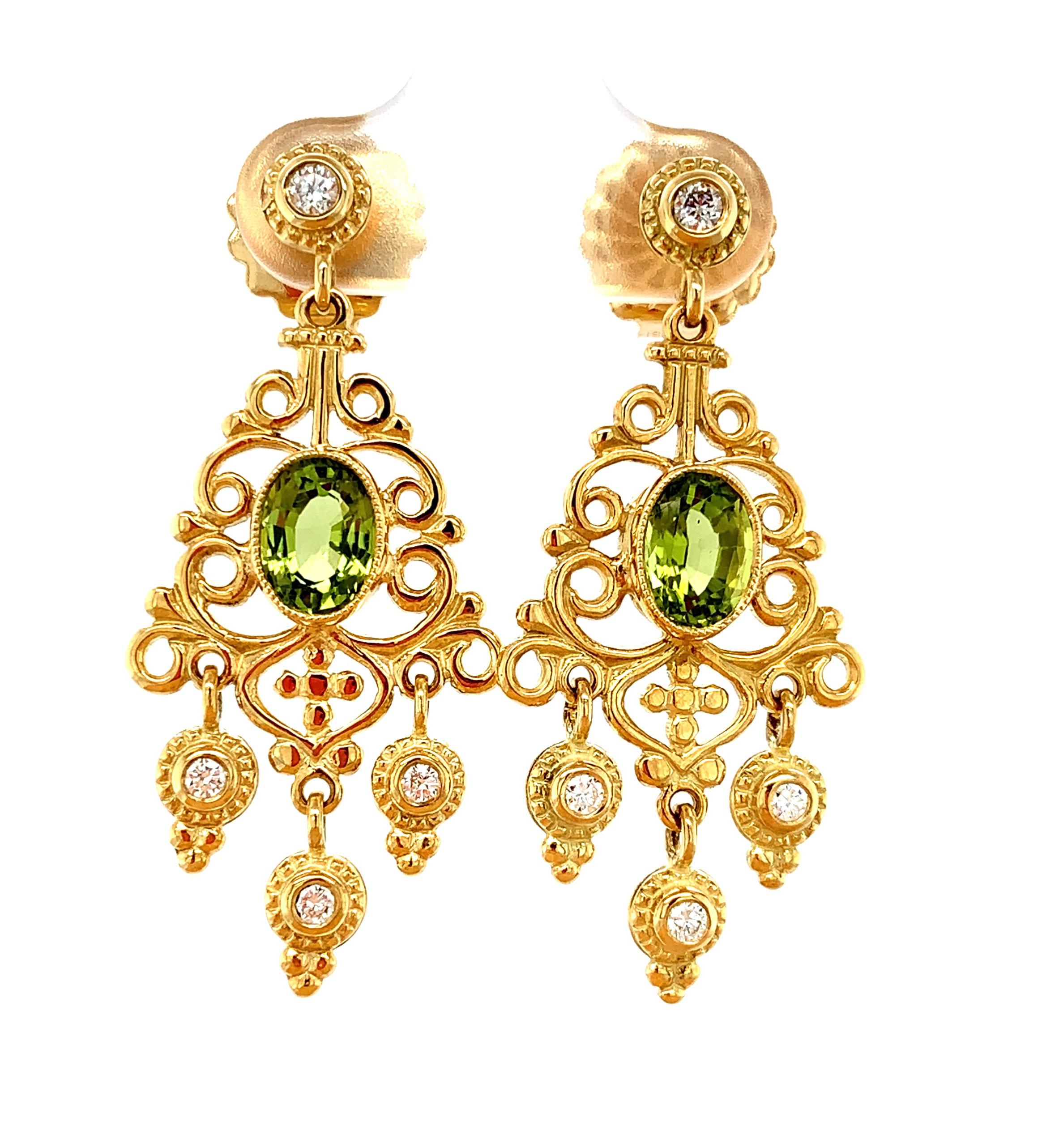 These earrings are so pretty when worn! They feature grass-green peridots and brilliant cut diamonds, set in an 18k yellow gold handmade design by our Master Jewelers in Los Angeles. These Victorian Era inspired jewels have elegant movement and