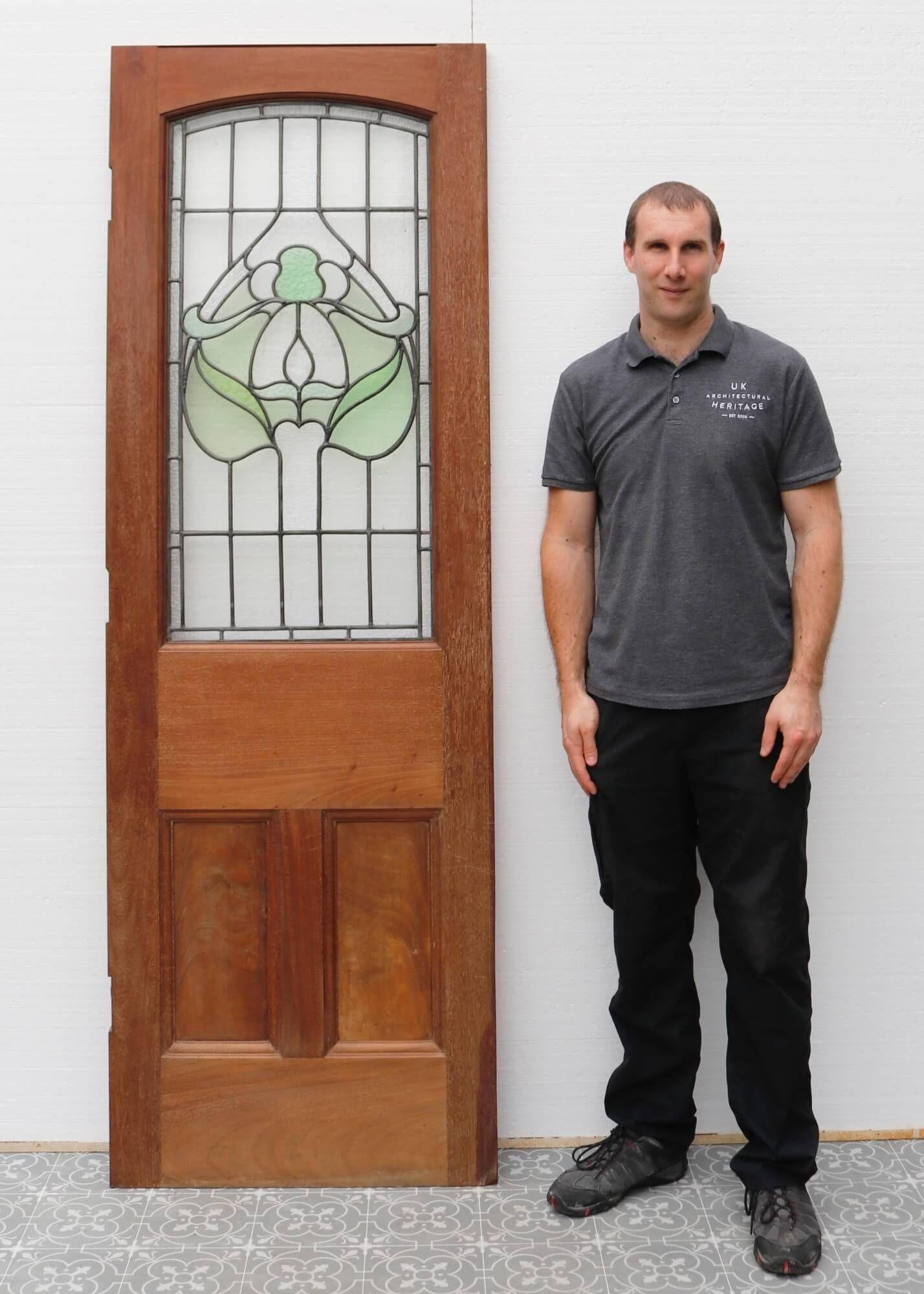 You can imagine this Victorian internal door with stained glass situated in a period kitchen or in the entrance hall of a traditional Victorian townhouse. This mahogany door is over 140 years old, dating from the late 1800s. It is fitted with fully