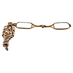 Pendentif lorgnette en or 14 KT serpent victorien complexe