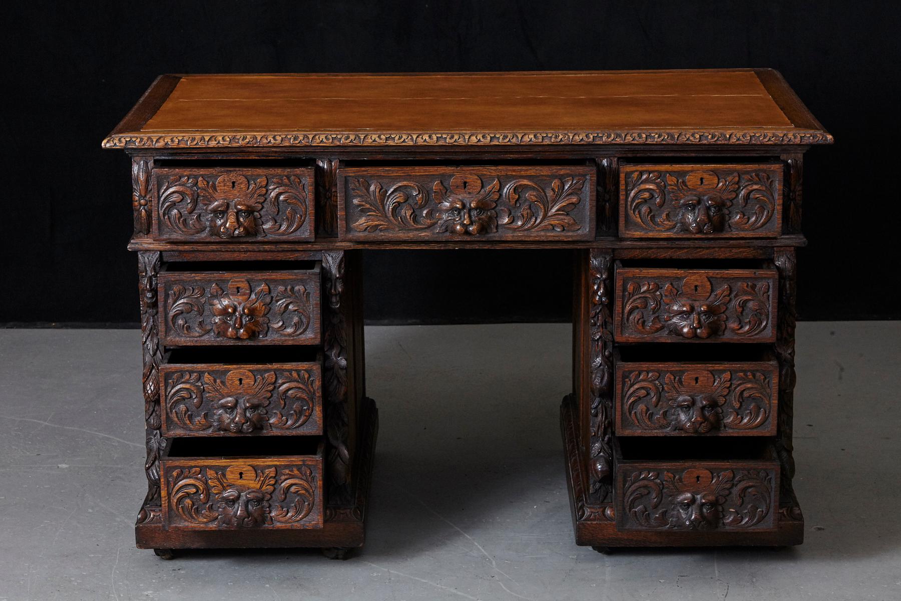 Hand-Carved Victorian Intricately Carved Oak Kneehole Desk with Lion Head Handles