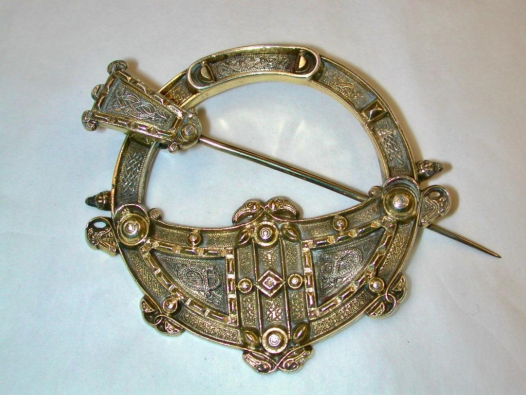 Victorian Irish Silver Gilt Tara Brooch,made by Waterhouse and Co of Dublin,circa 1860.
Can be used today as a shawl pin or a decorative brooch.
The Celtic decoration is superb and very crisp and made of silver with a gilt finish.
The original Tara